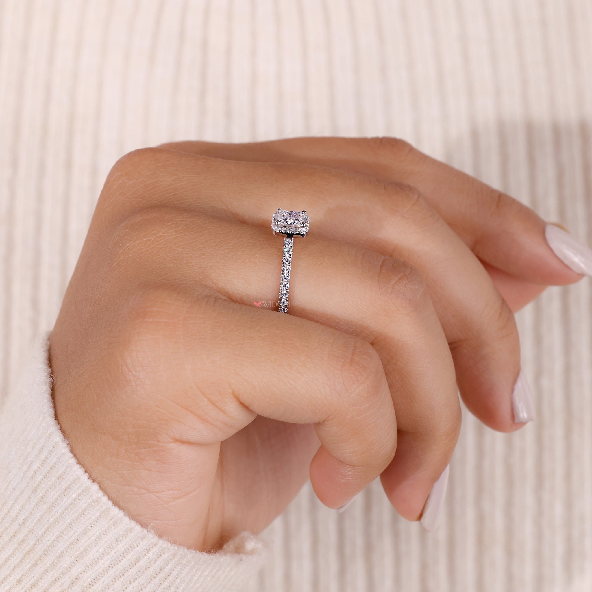 Princes cut ring with pave accents, highlighting its brilliance and adding a modern twist to a classic design.