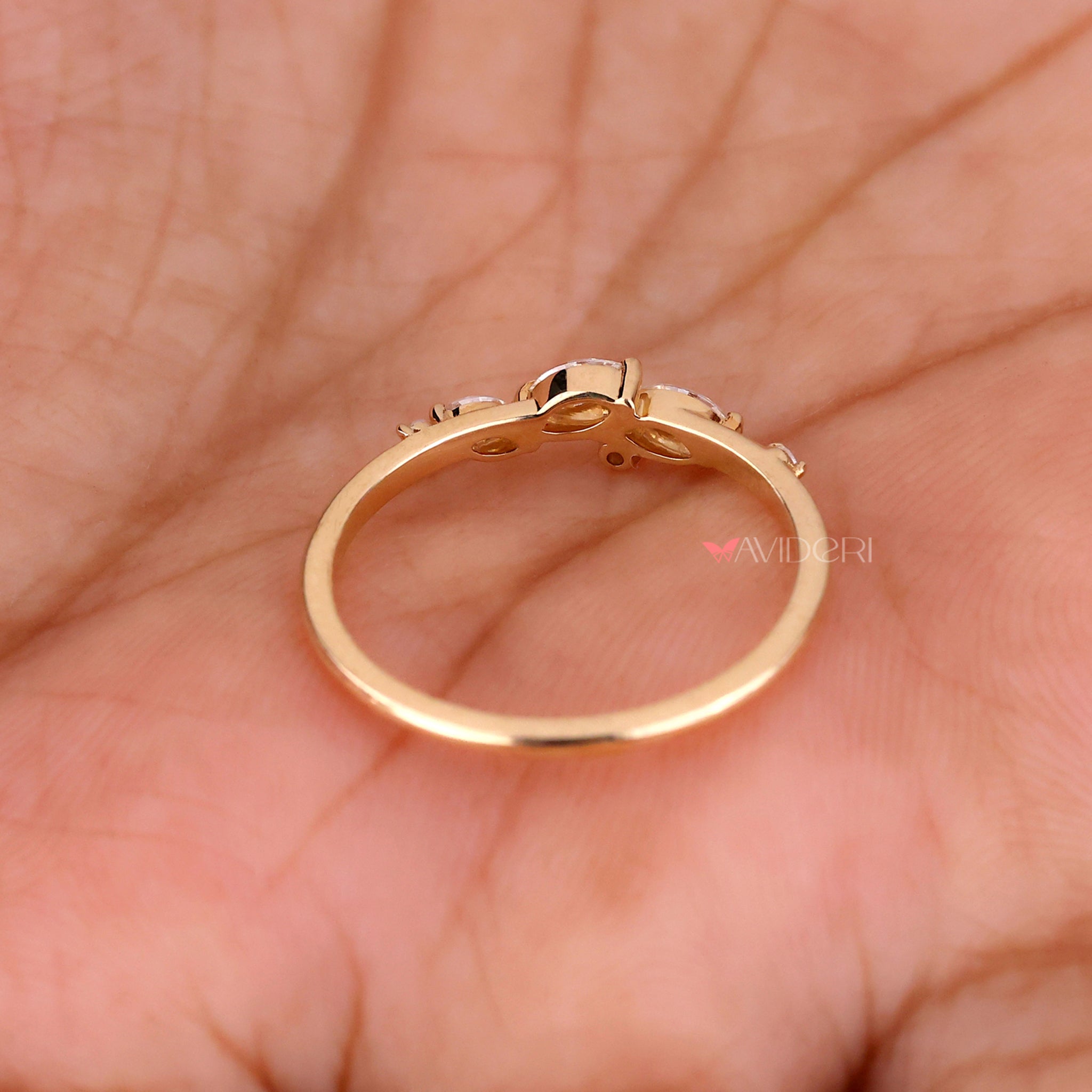 Marquise round diamond band with unique style.