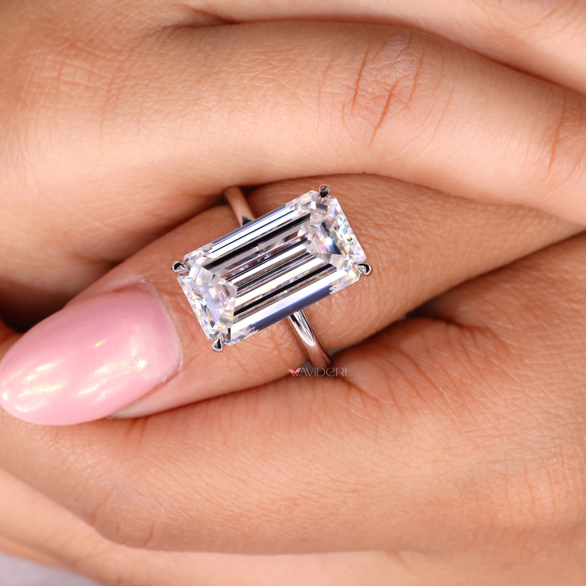 Long emerald cut ring with a personalized touch for her.