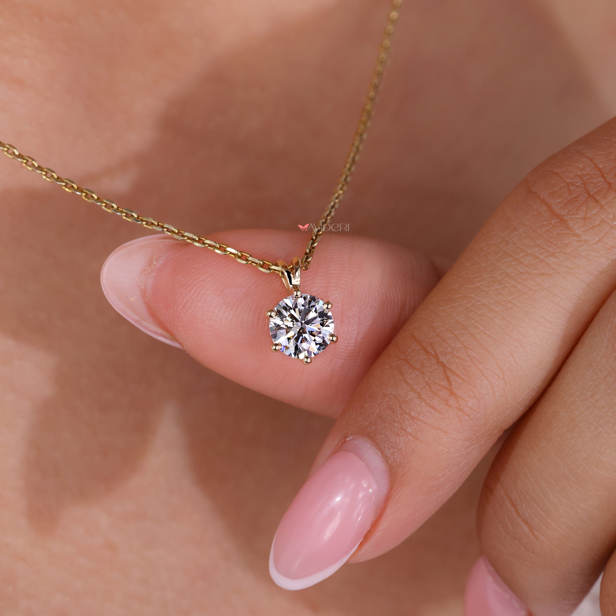 6 prong pendant with a flawless round diamond.