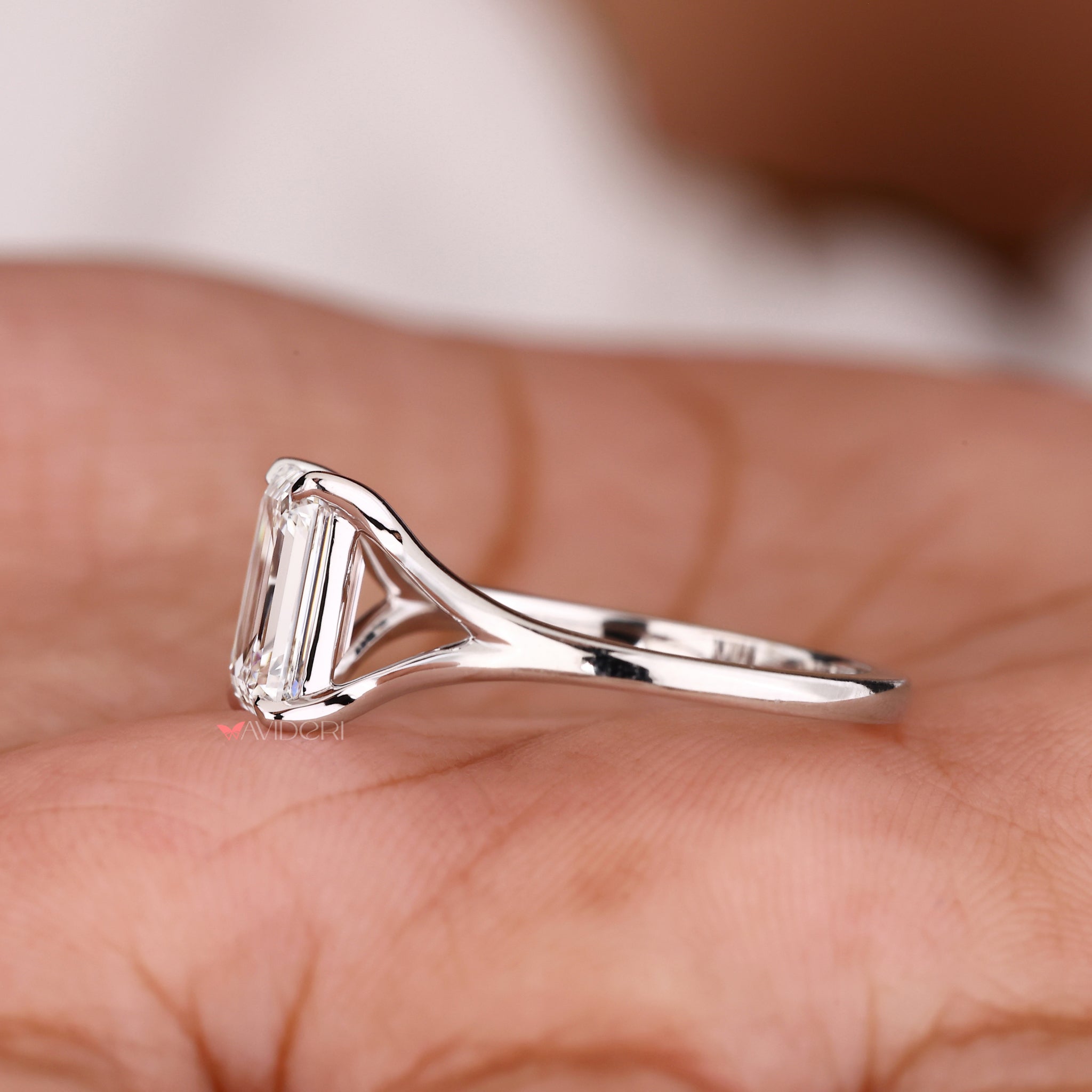 Handmade Emerald Solitaire Ring designed with Lab Grown Diamond and split ring shank for a modern, elegant look.