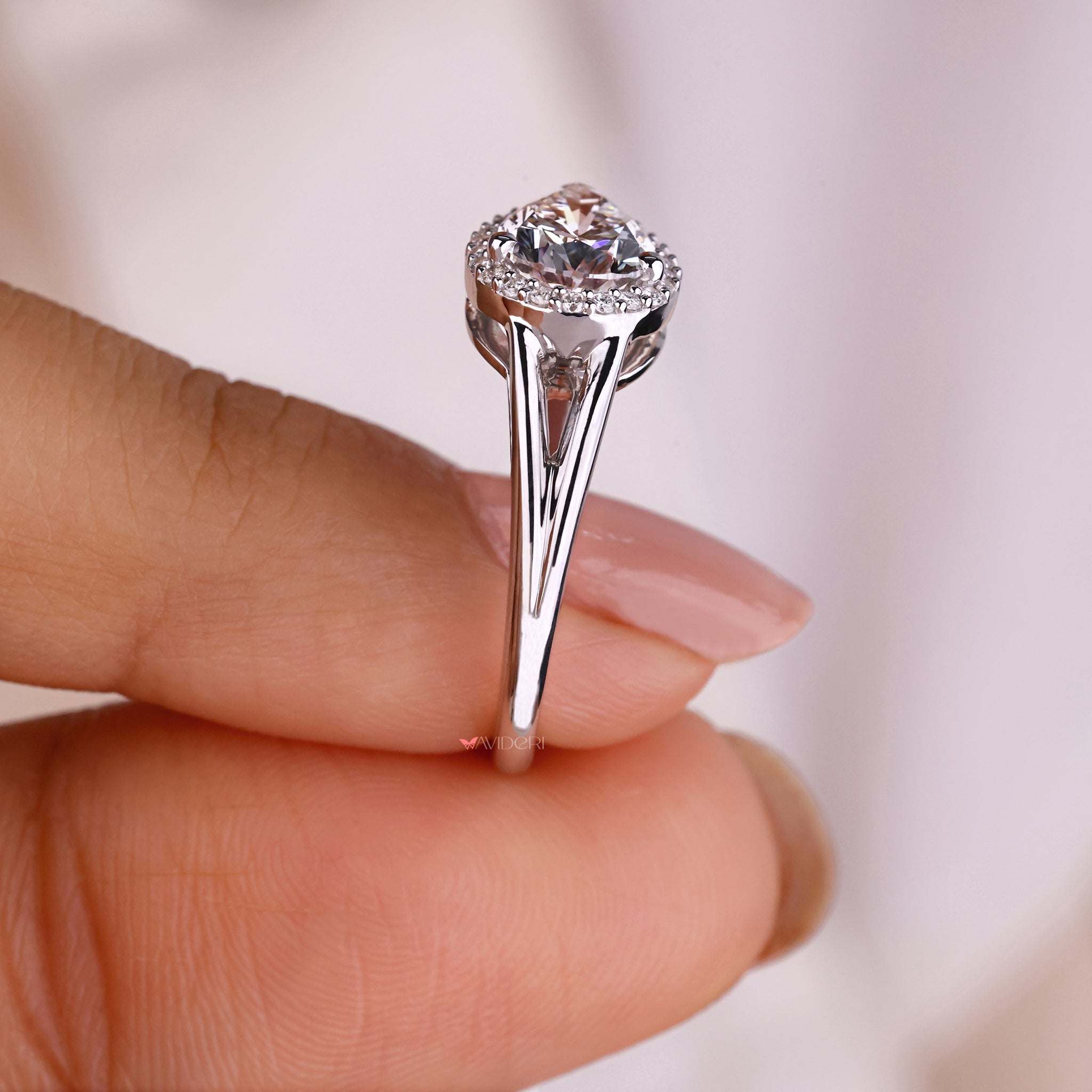 Pear shaped ring with a round diamond ring.