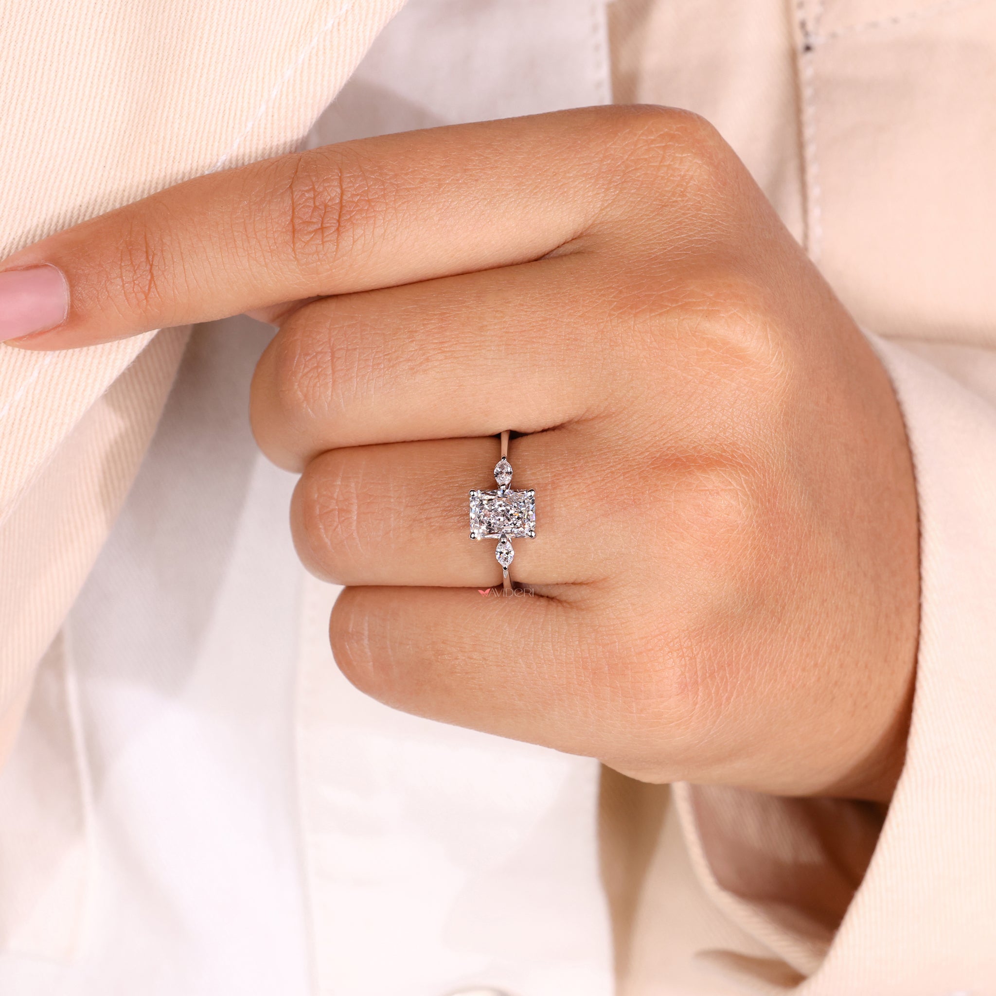 Three stone engagement ring symbolizes unity and love