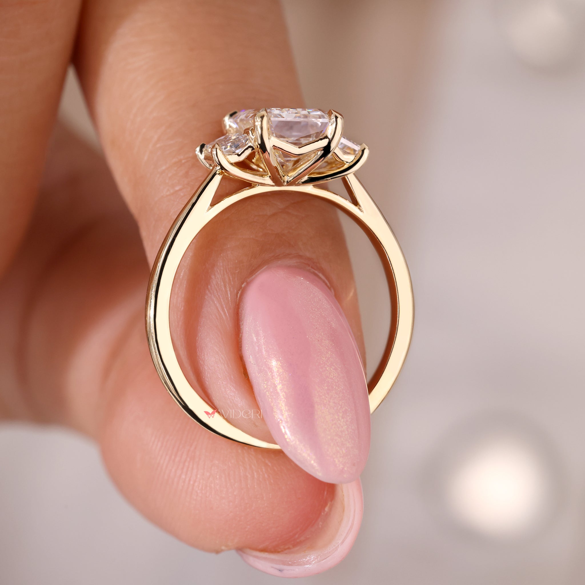 Yellow gold ring engagement with a stunning emerald cut diamond ring for elegance.