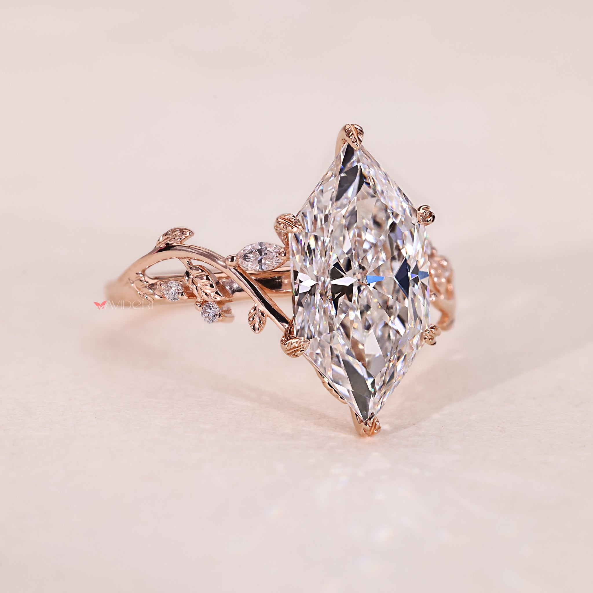 Leaf ring with IGI certified Lab Grown Diamond in a yellow gold ring setting.