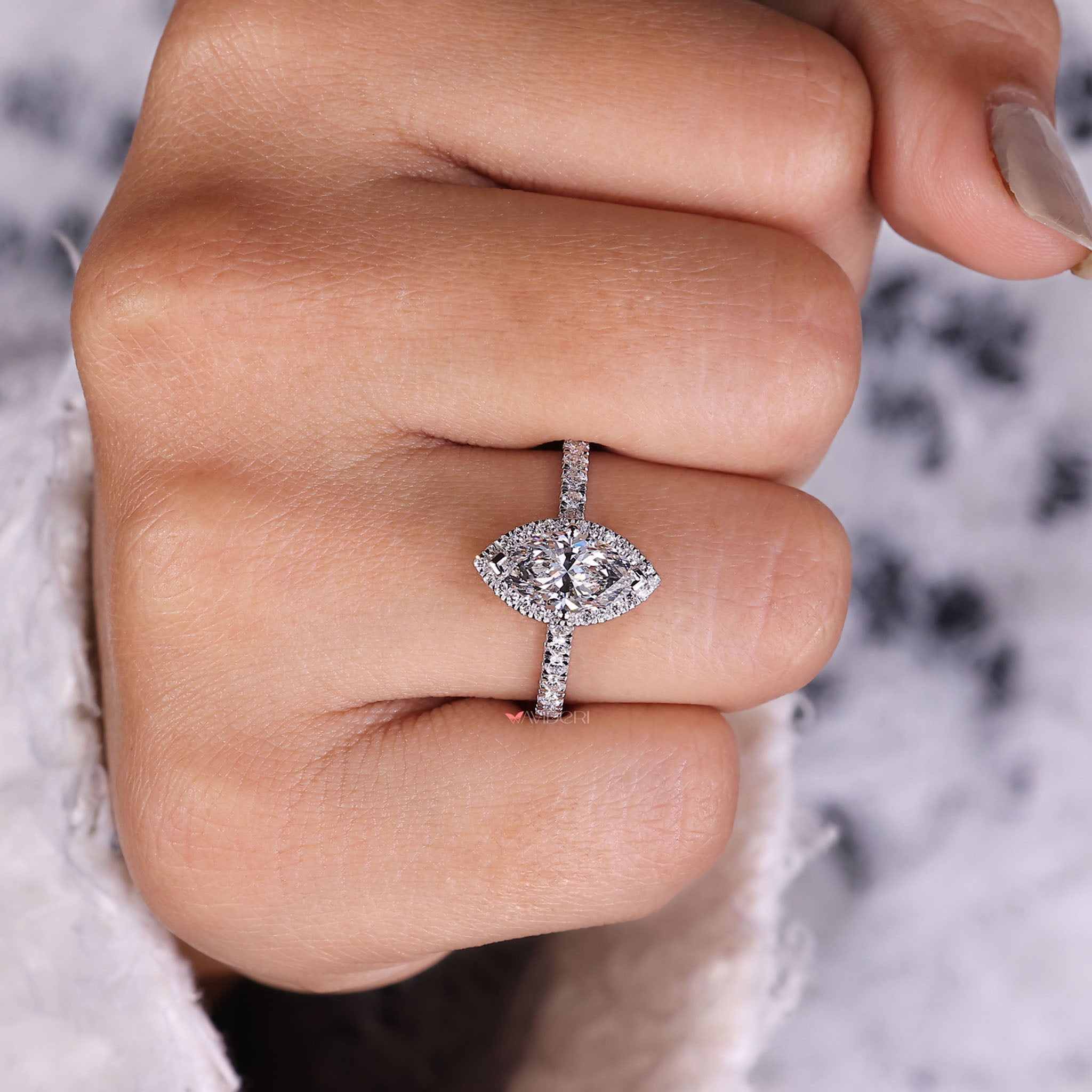 Pave diamond ring with intricate detailing, featuring delicate pavé diamonds for a luxurious and timeless design.