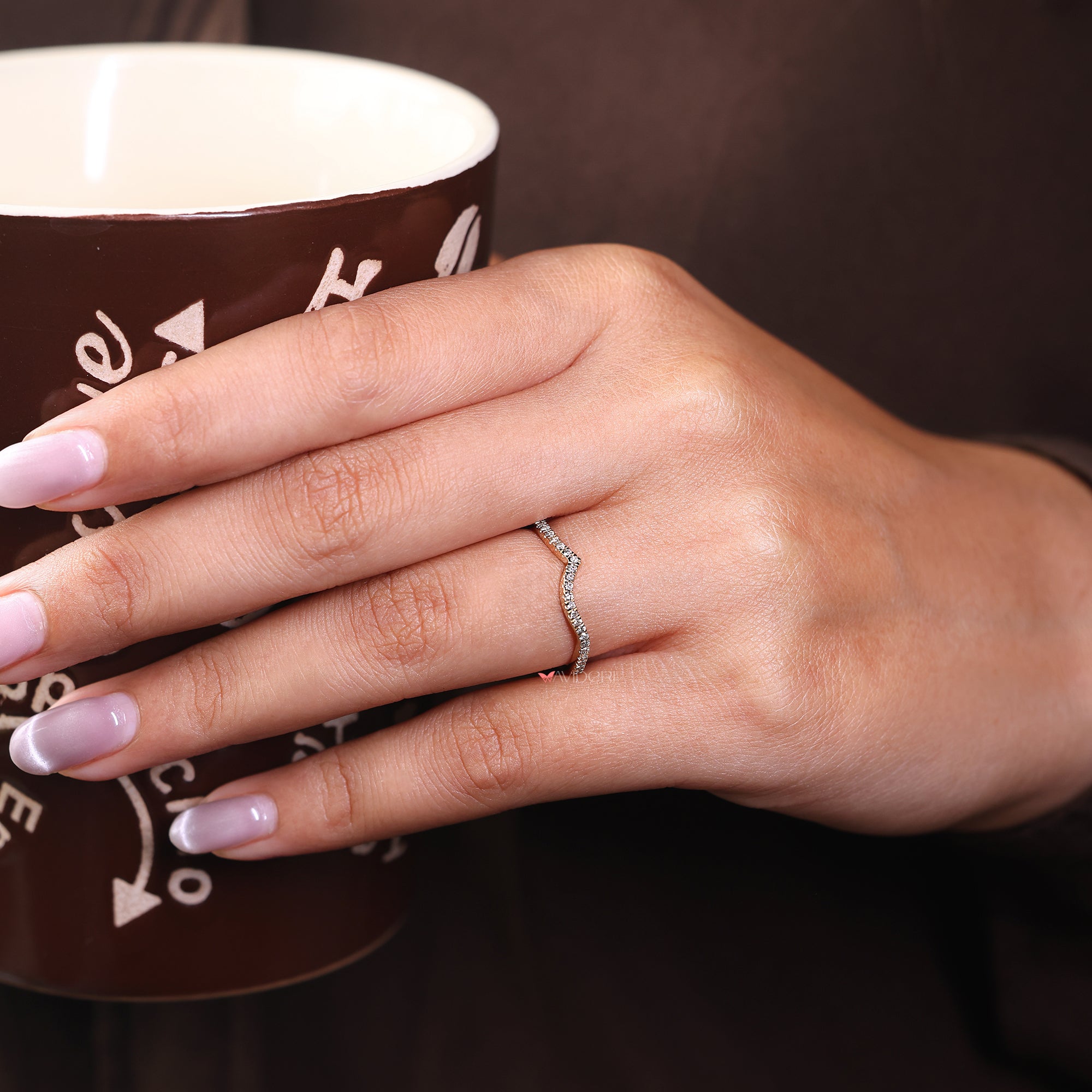 Wave diamond eternity band with a continuous line of sparkling diamonds, perfect for everyday wear.