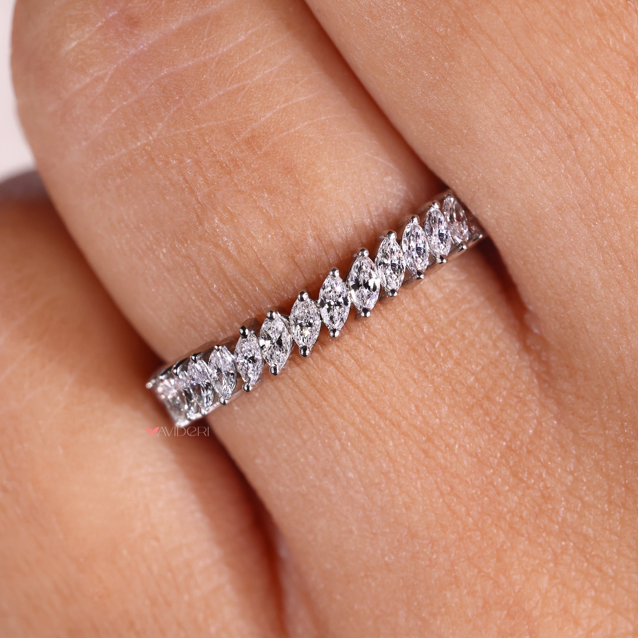 Prong setting holds each diamond tightly and safely.