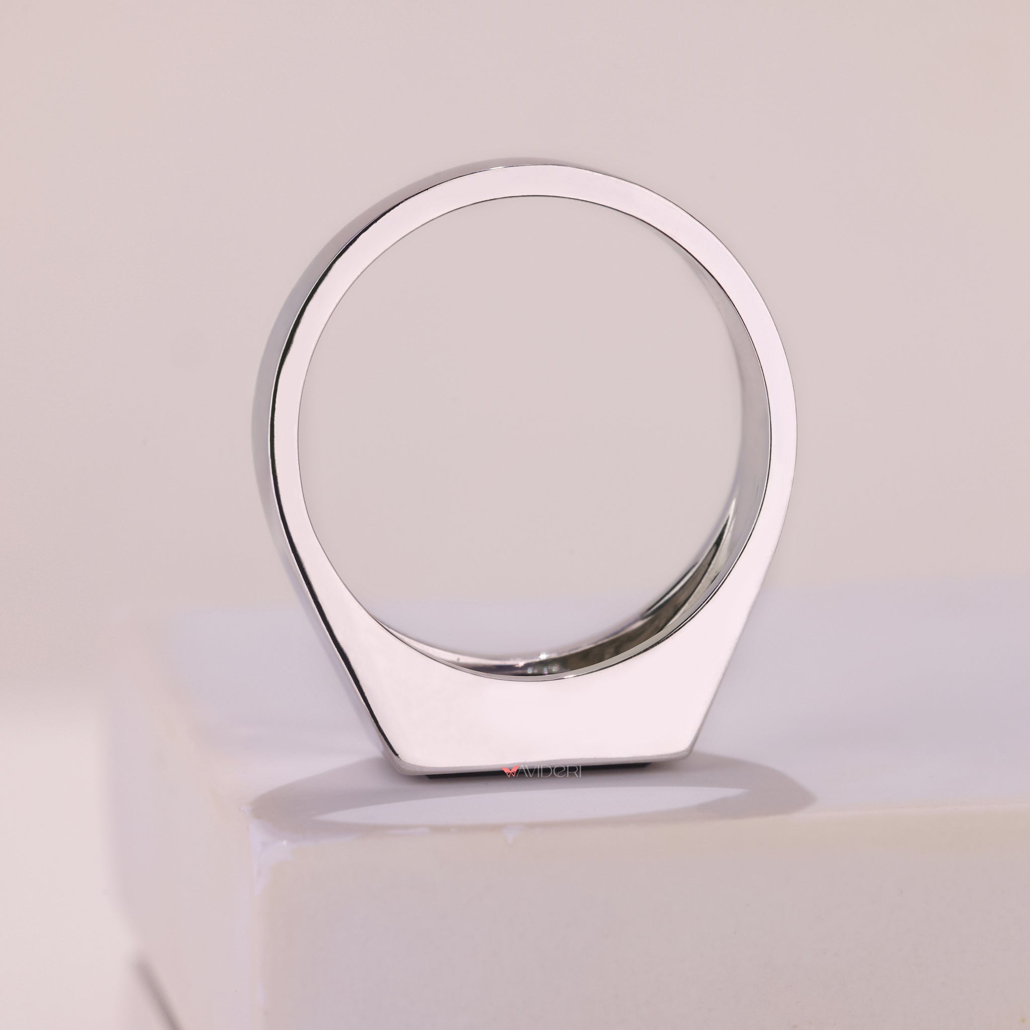 Beautiful bezel set engagement ring with modern charm