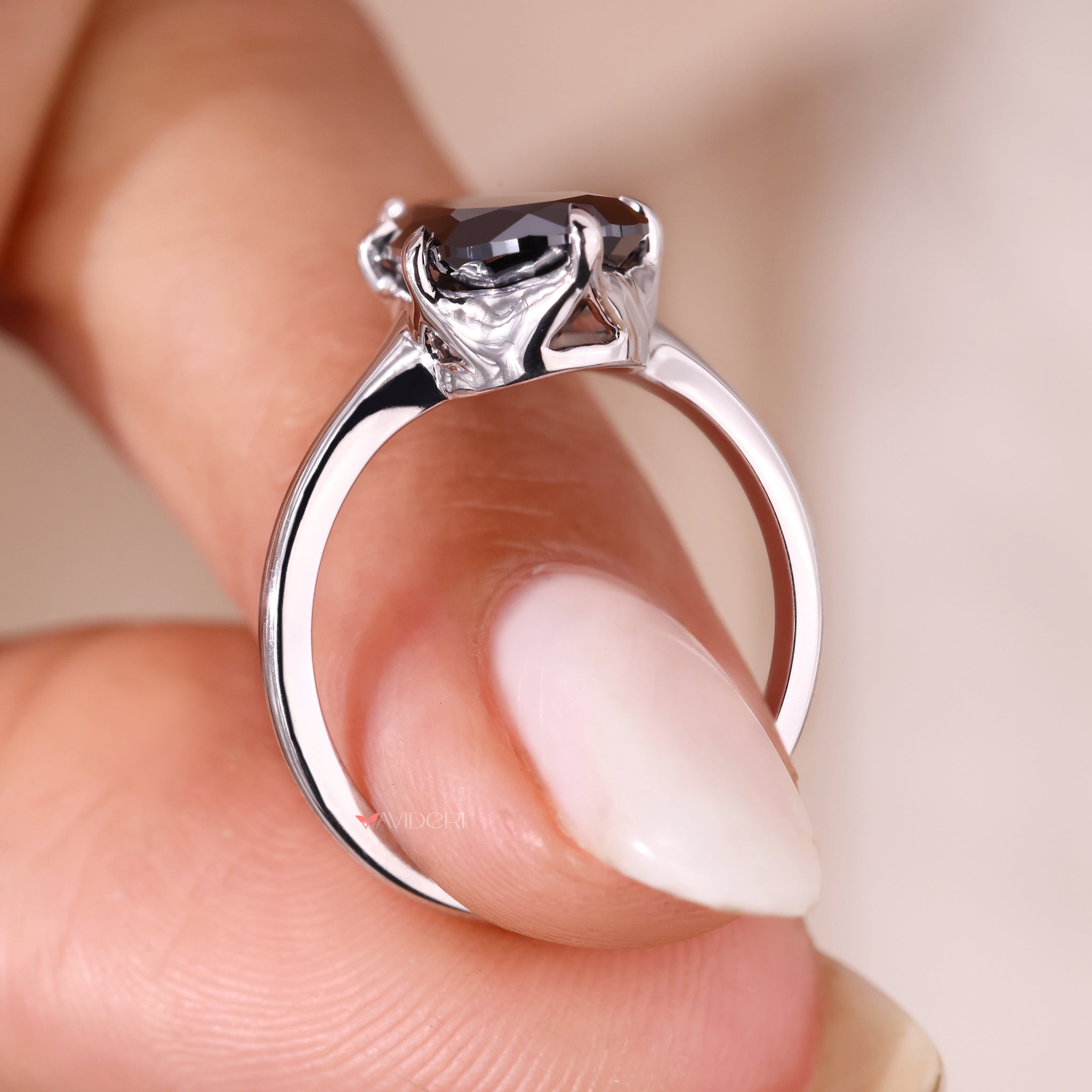 Elongated Pear Cut Ring with a sleek white gold band.