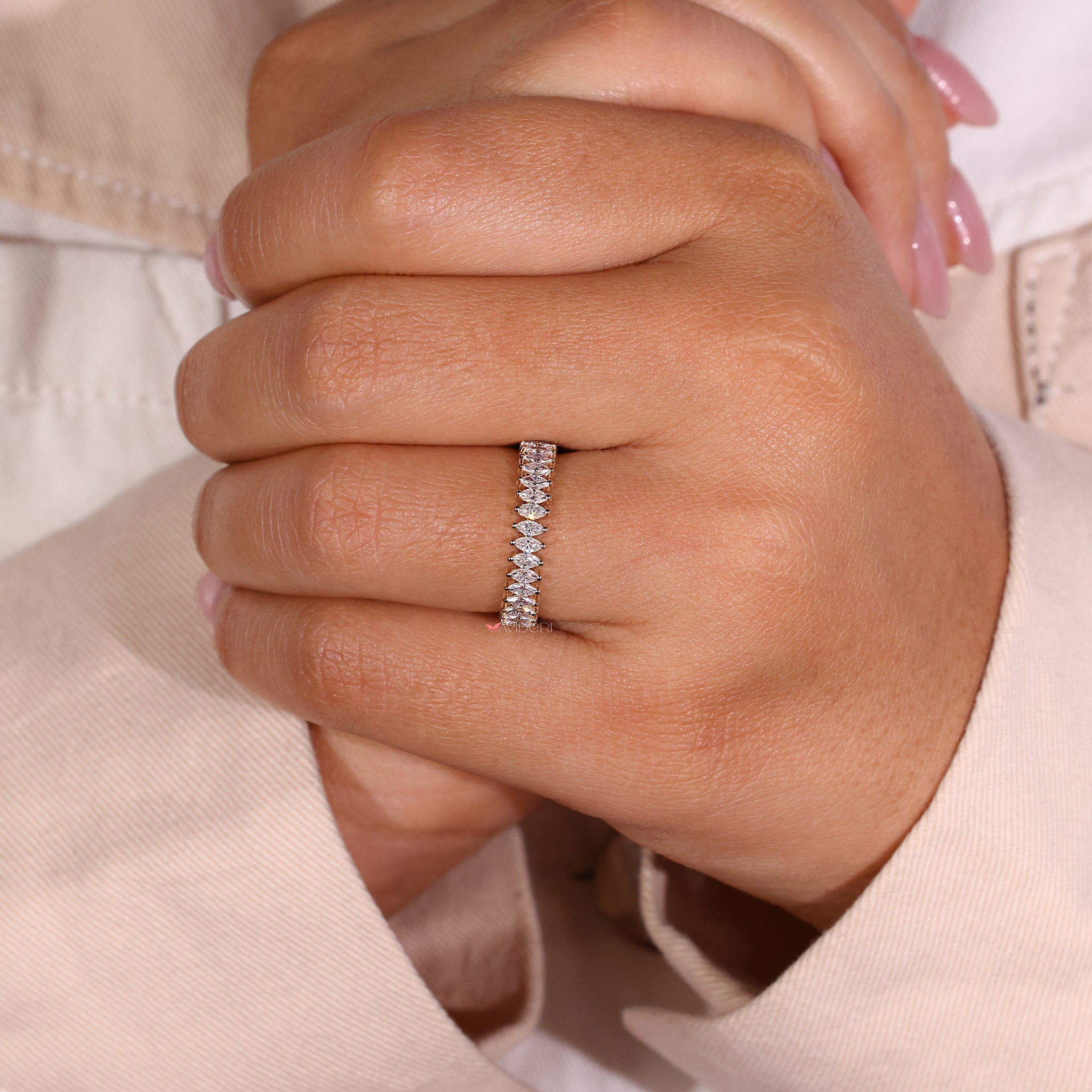 Marquise wedding band in yellow gold for a unique touch.