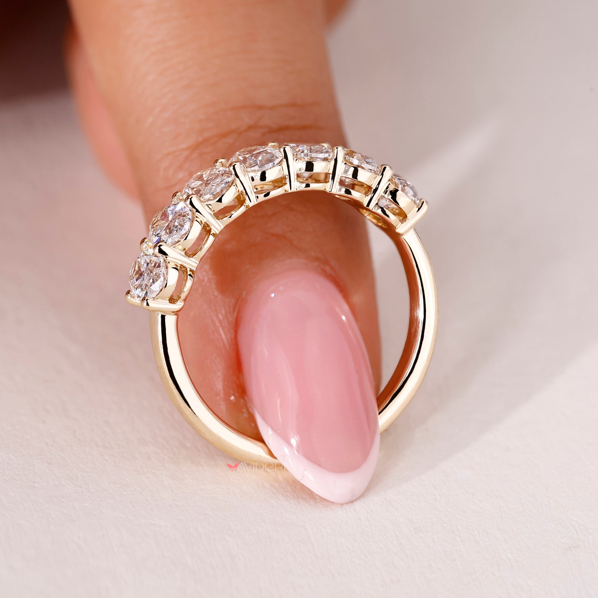 IGI certified oval diamond band ensuring quality and authenticity
