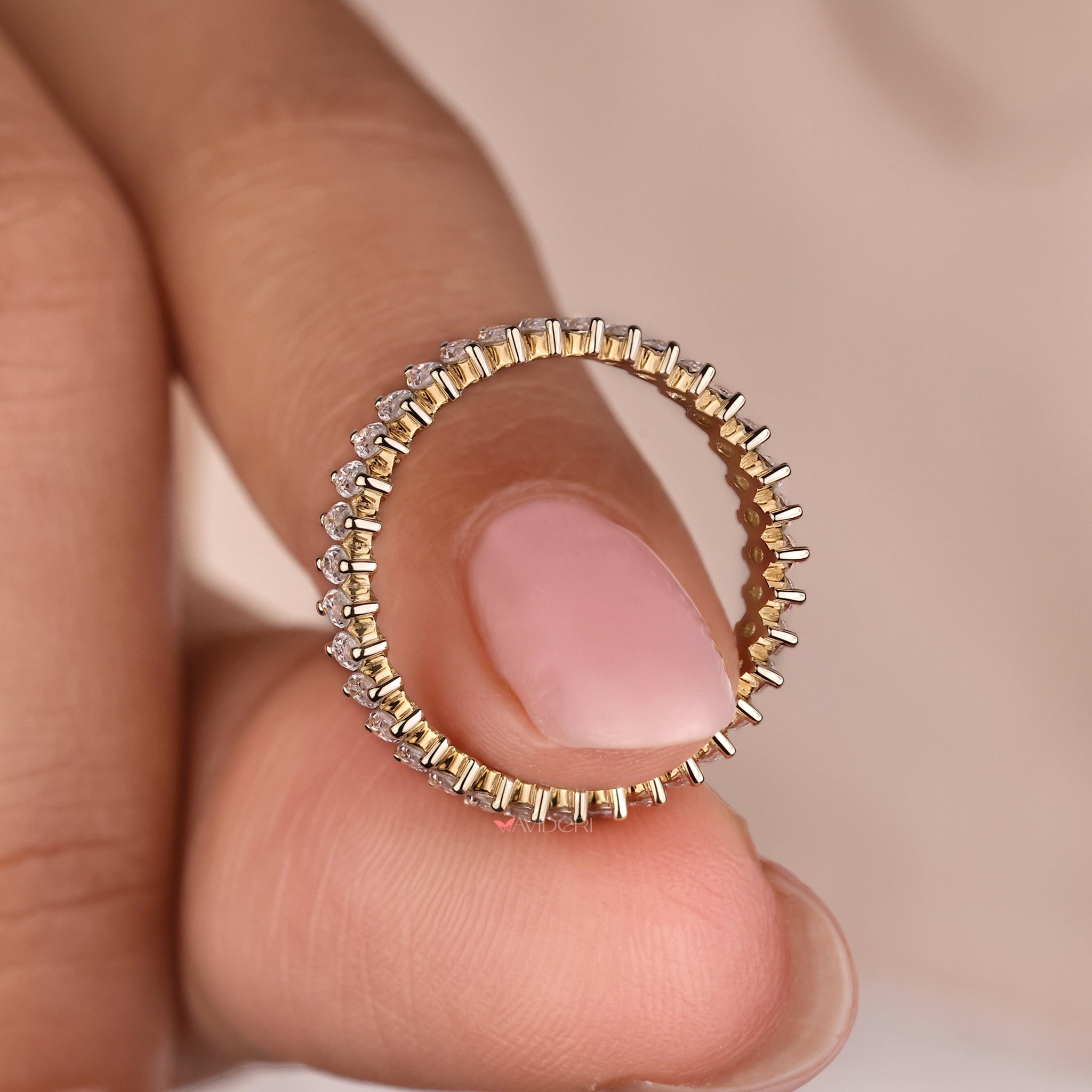 Yellow gold diamond eternity bands for a luxurious look.