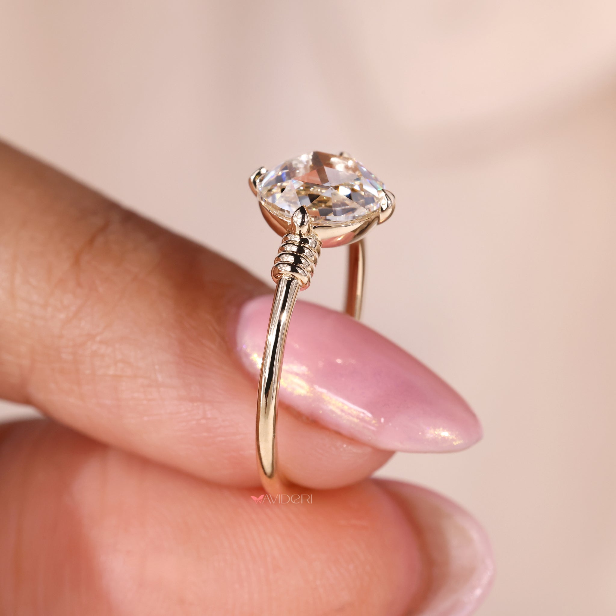 Claw prong ring featuring a rose cut engagement ring for extra sparkle.