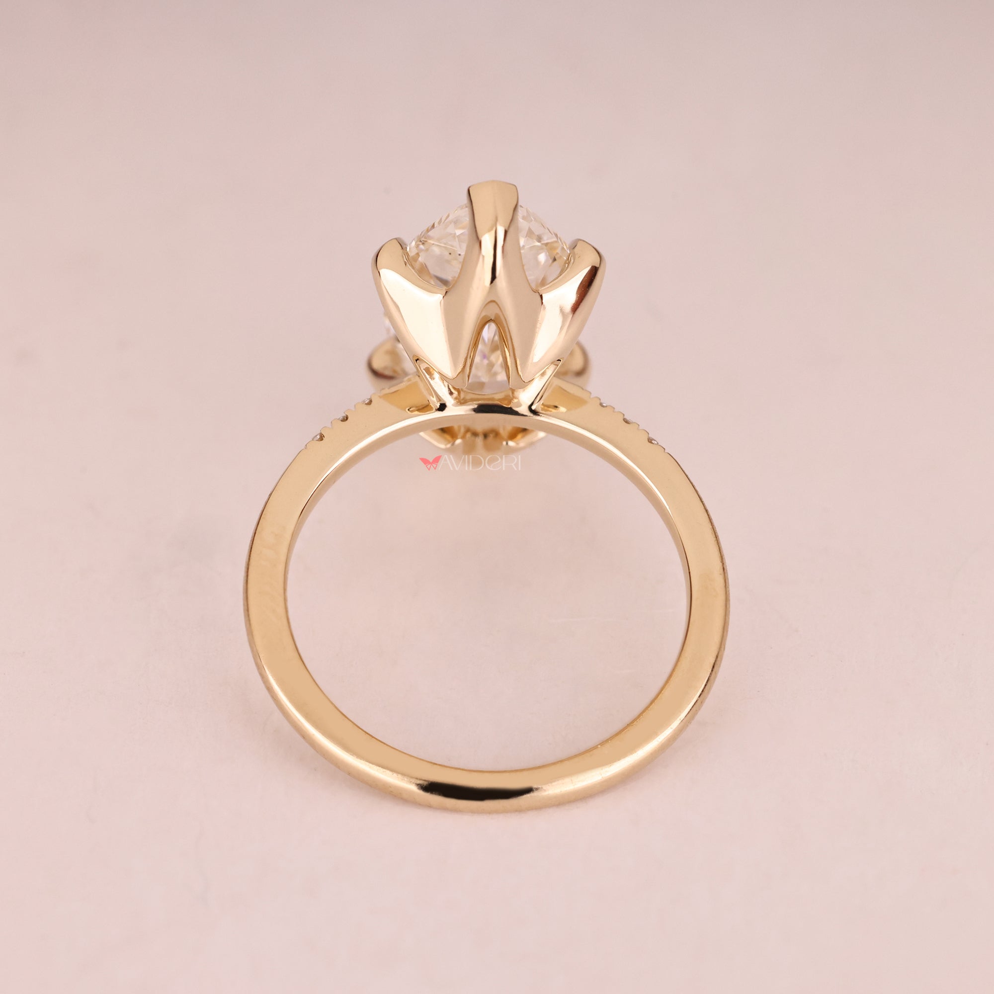 Yellow gold diamond ring for her with elegant marquise cut.