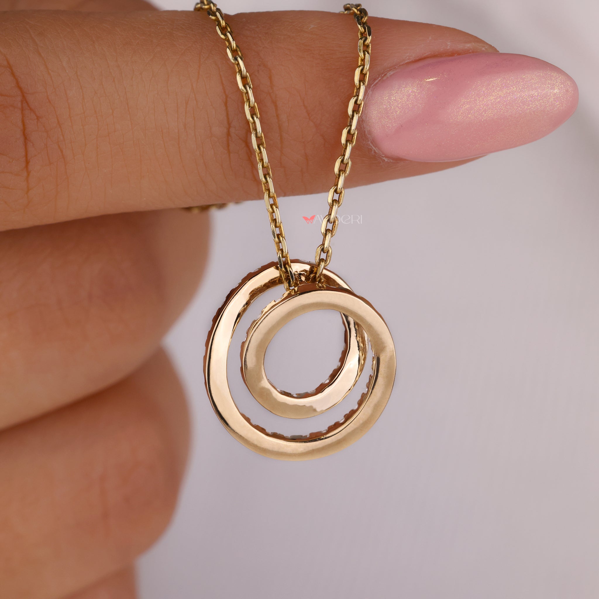 Diamond twist pendant featuring a round diamond for added sparkle.