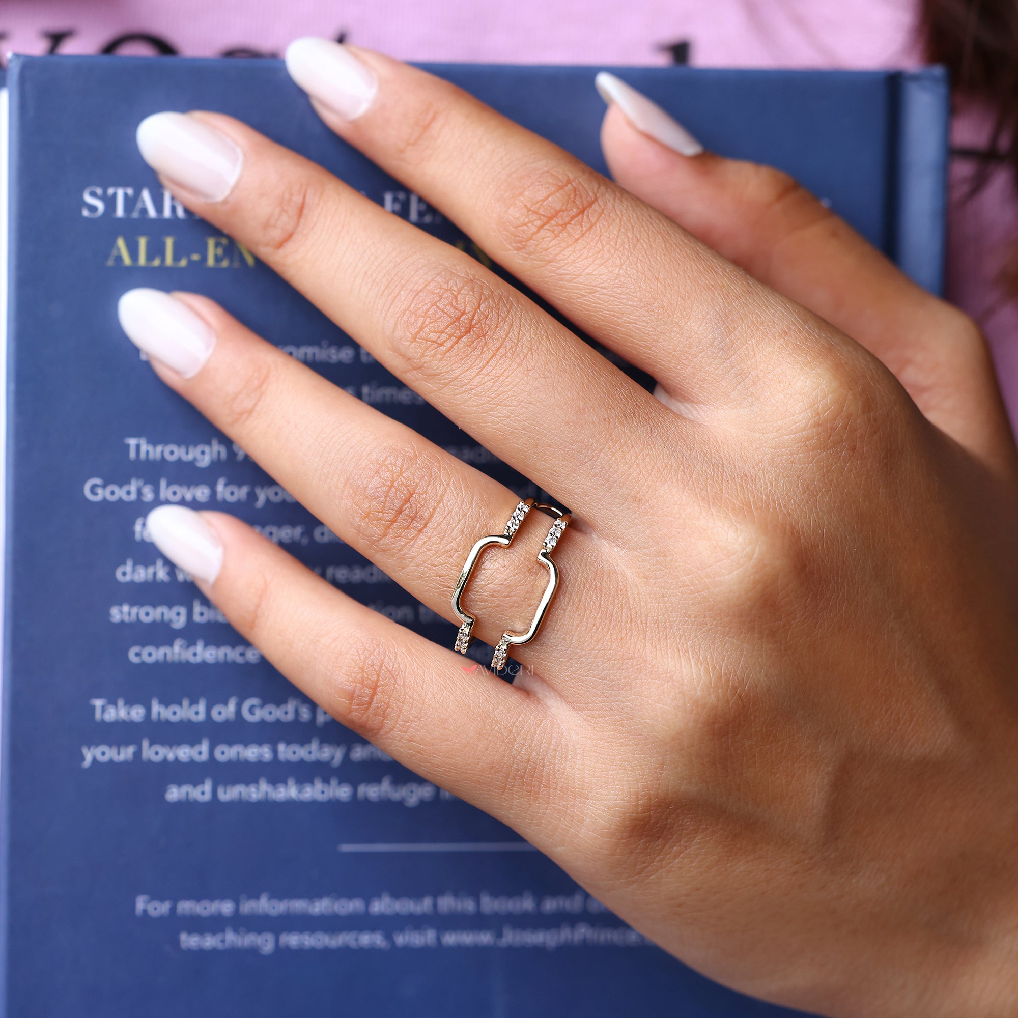 Wrap-style moissanite wedding band with custom fit.