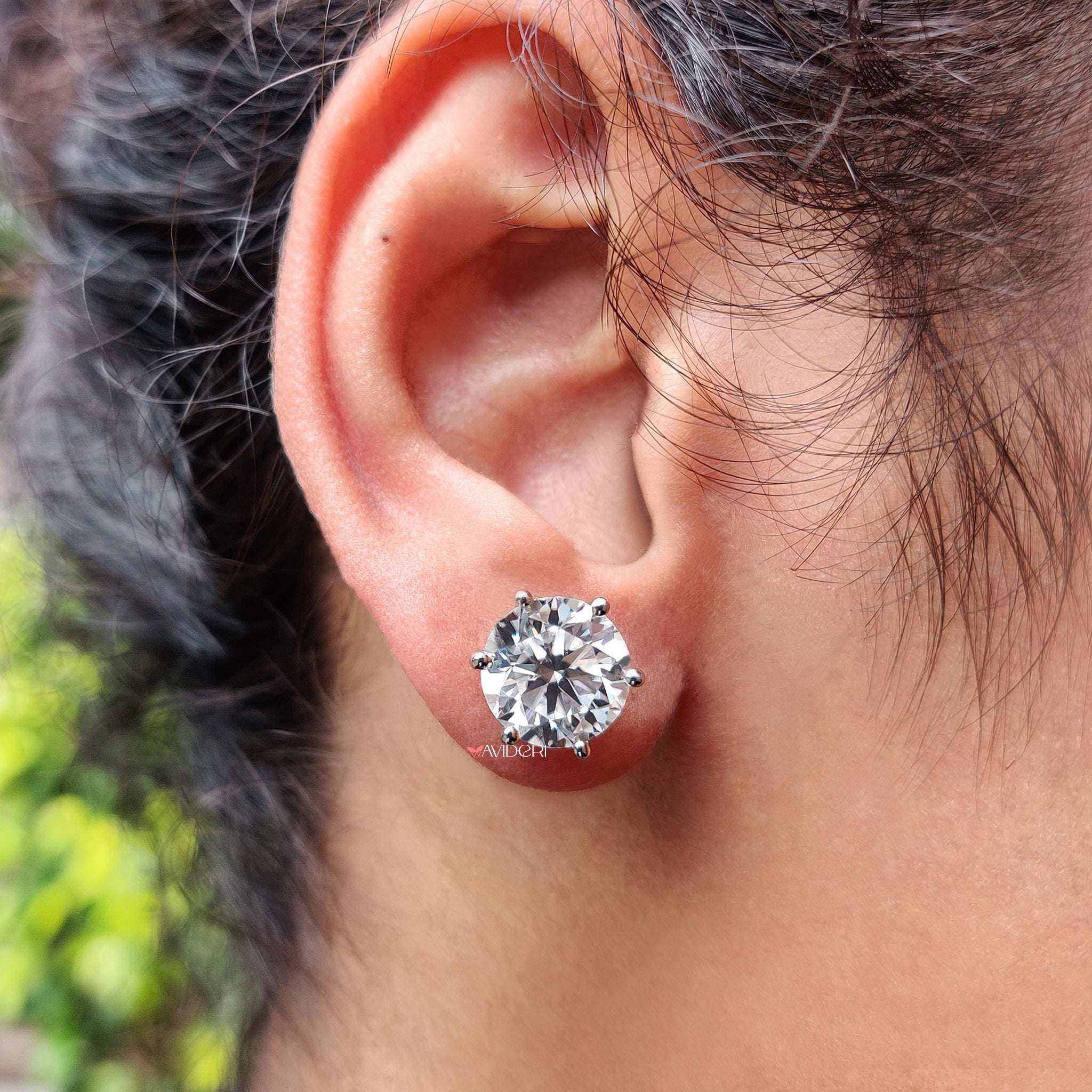 The earrings round design provides a clean, timeless look.