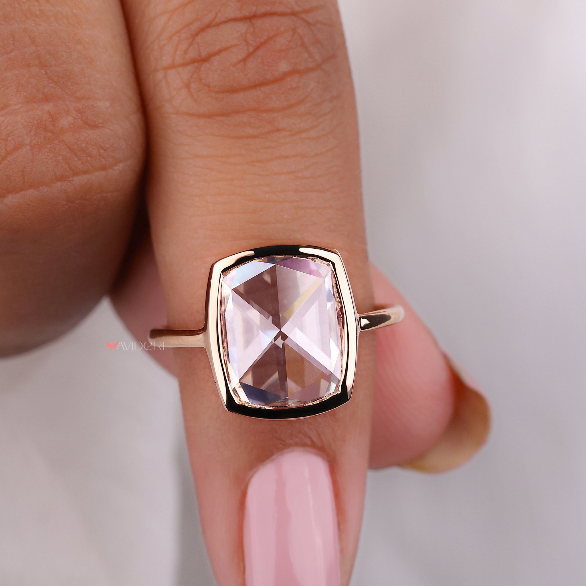 Highlight soft, glowing tones by choosing a rose gold ring for your bridal set.
