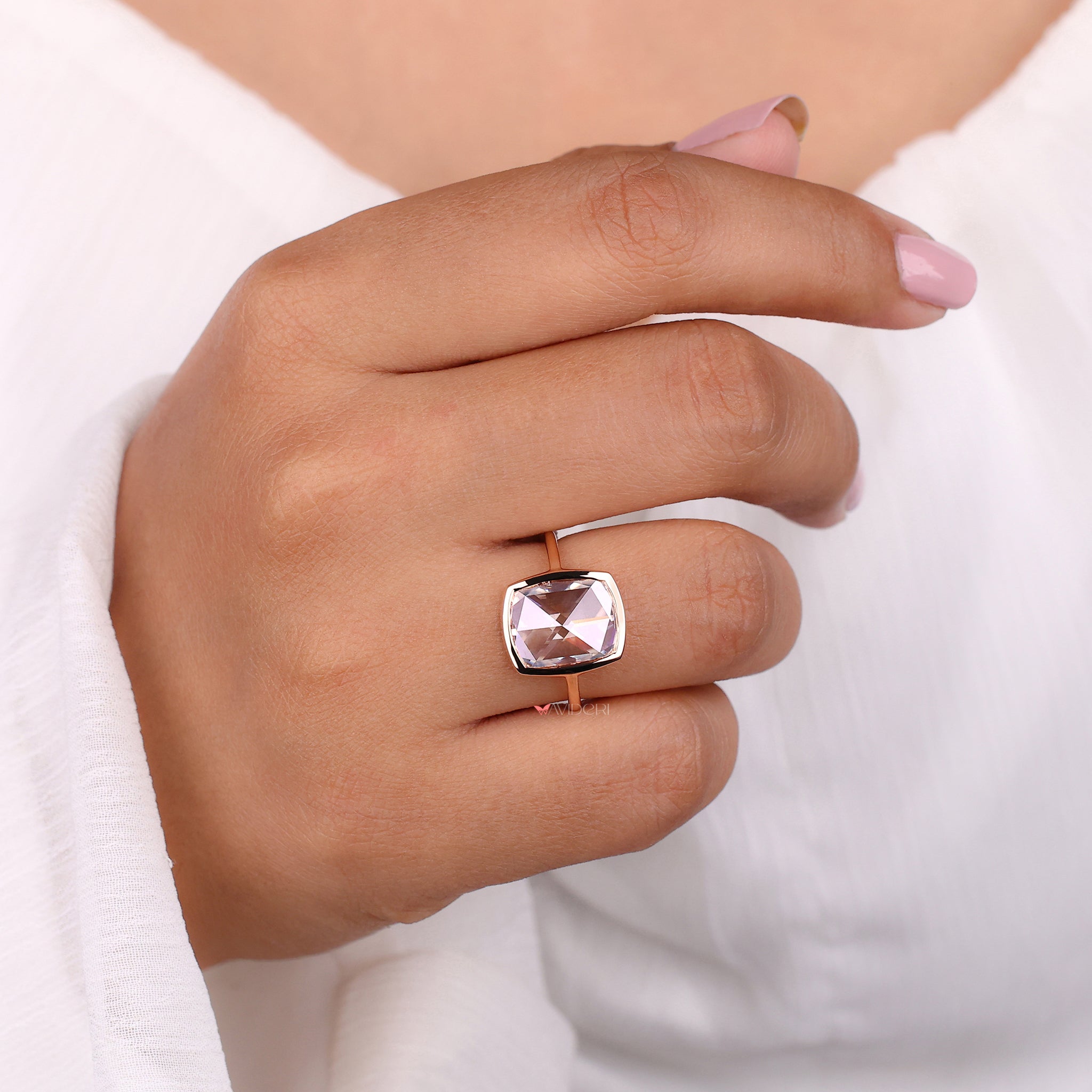 Frame your diamond in a bezel set ring designed for everyday comfort and lasting style.
