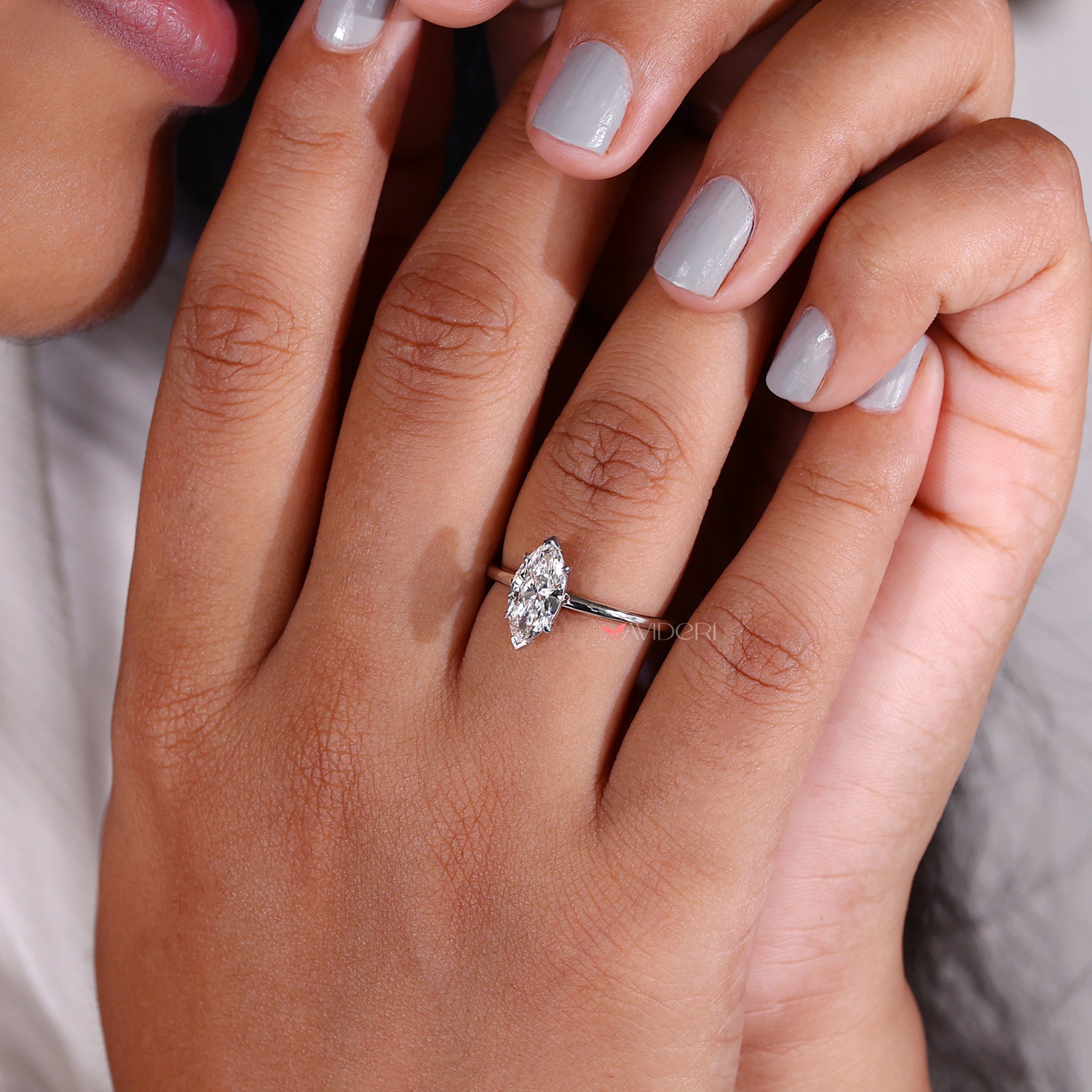 Avideri ring showcasing marquise solitaire and handmade jewelry craftsmanship for timeless elegance.
