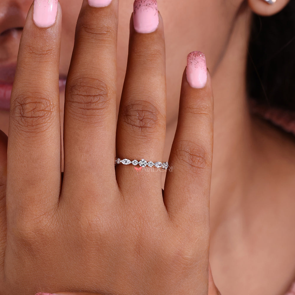 Handmade band with intricate diamond settings.
