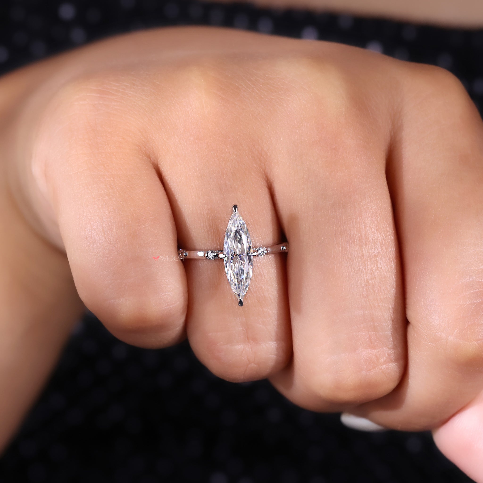 The compass prong setting adds a unique, secure hold to the stone, elevating its brilliance.
