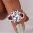 Emerald Moissanite engagement ring featuring a vibrant green stone and elegant design.
