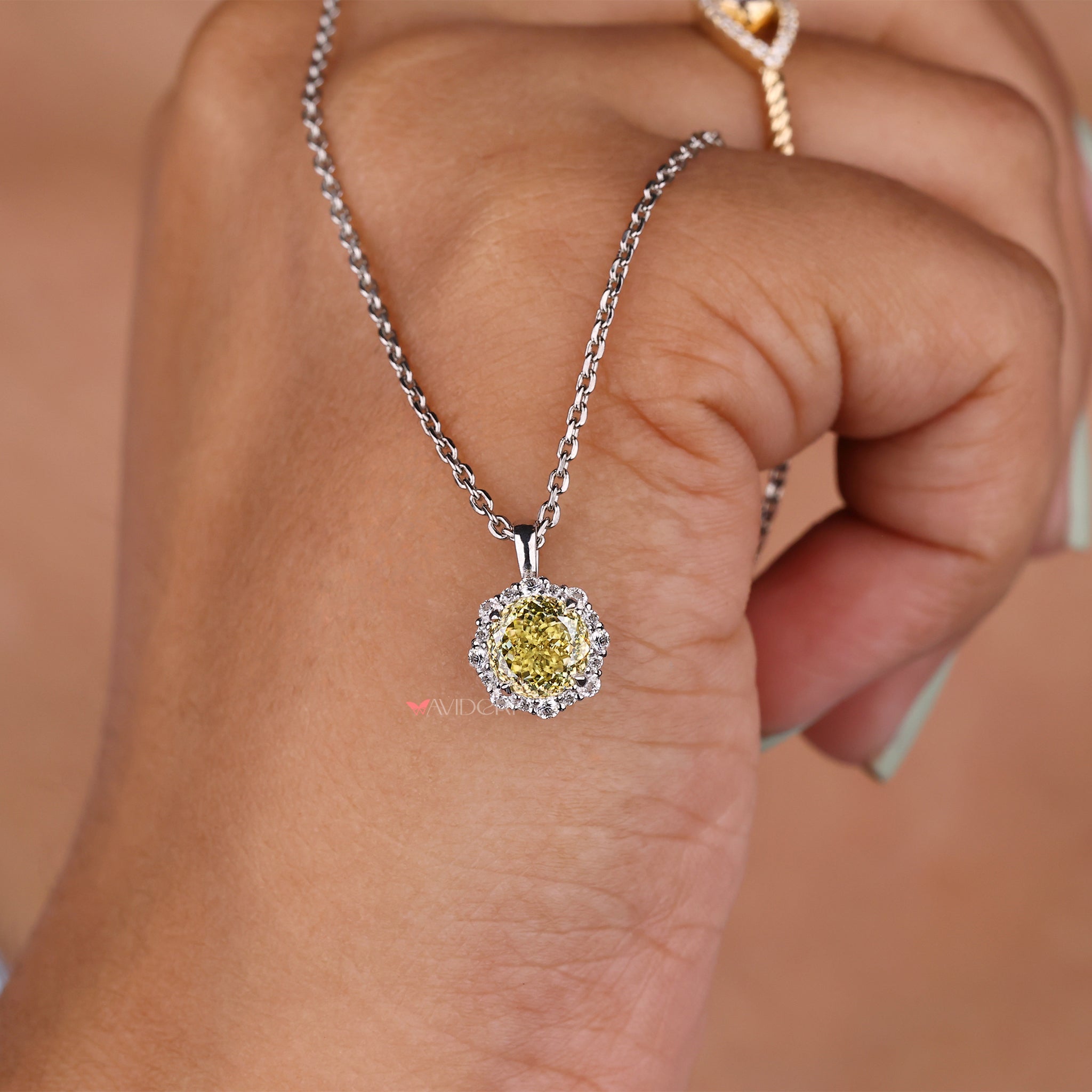 Cluster halo wedding pendant with sparkling stone accents.