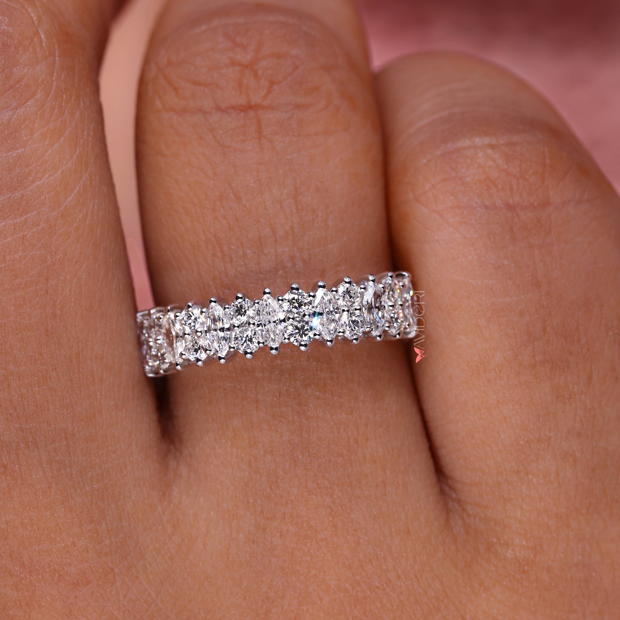 This marquise diamond wedding band offers bold yet graceful appeal.
