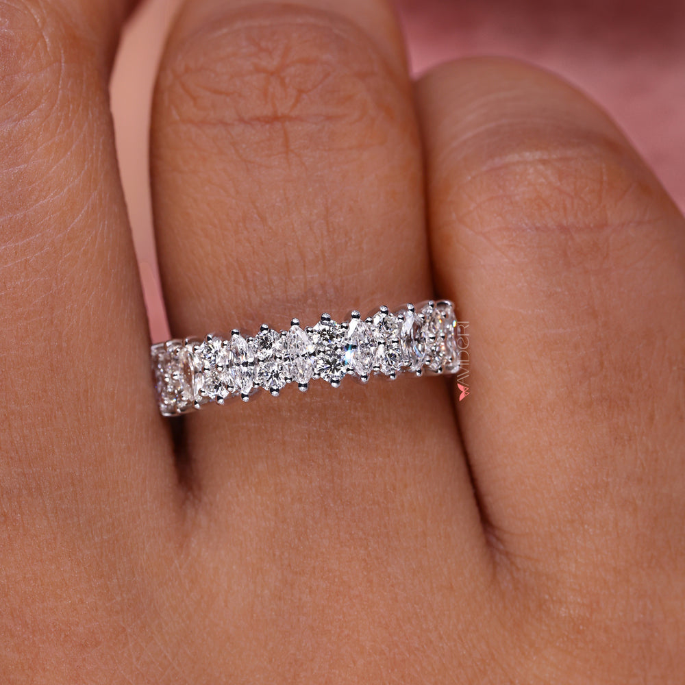 This marquise diamond wedding band offers bold yet graceful appeal.
