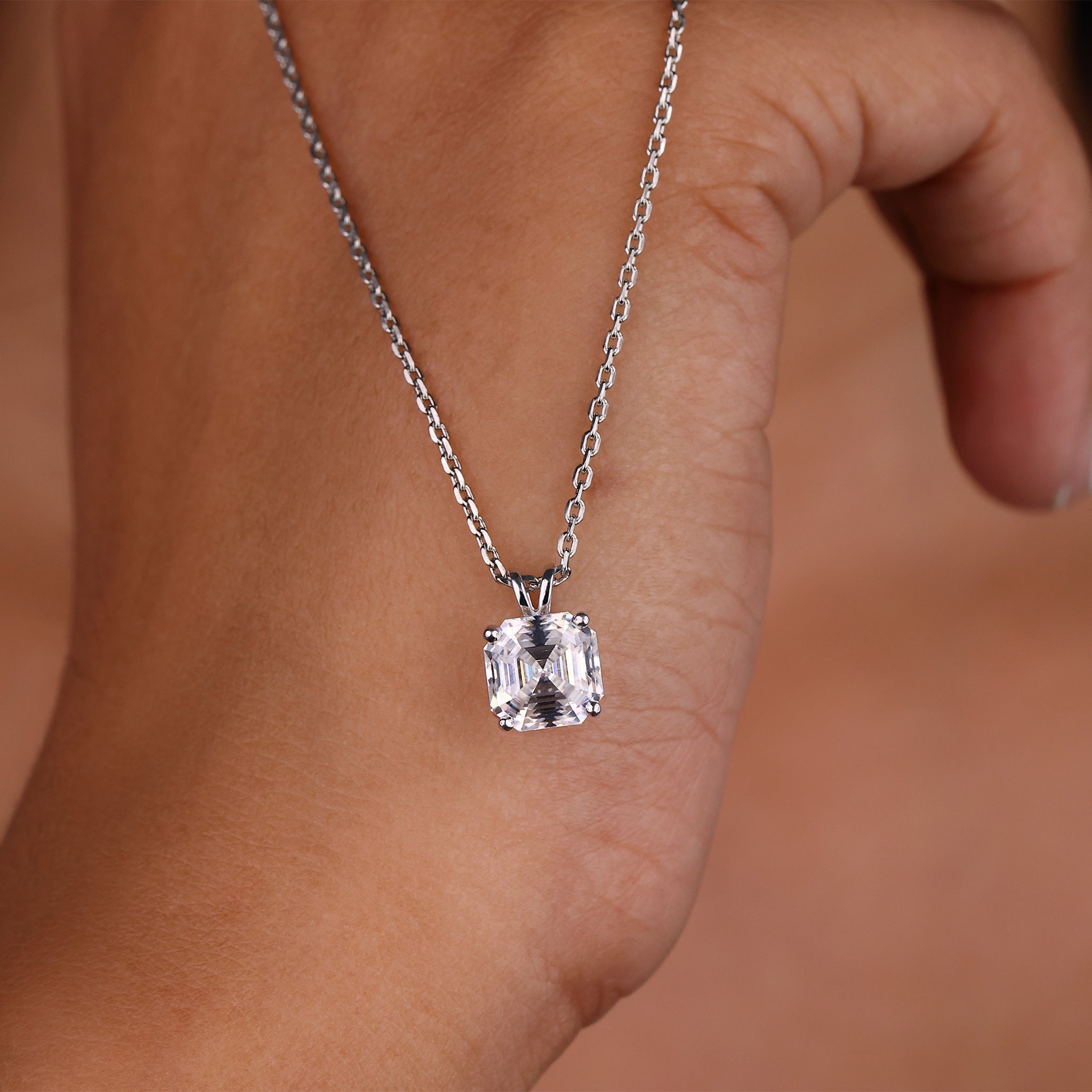 Bunny ear pendant with a cute, playful design.