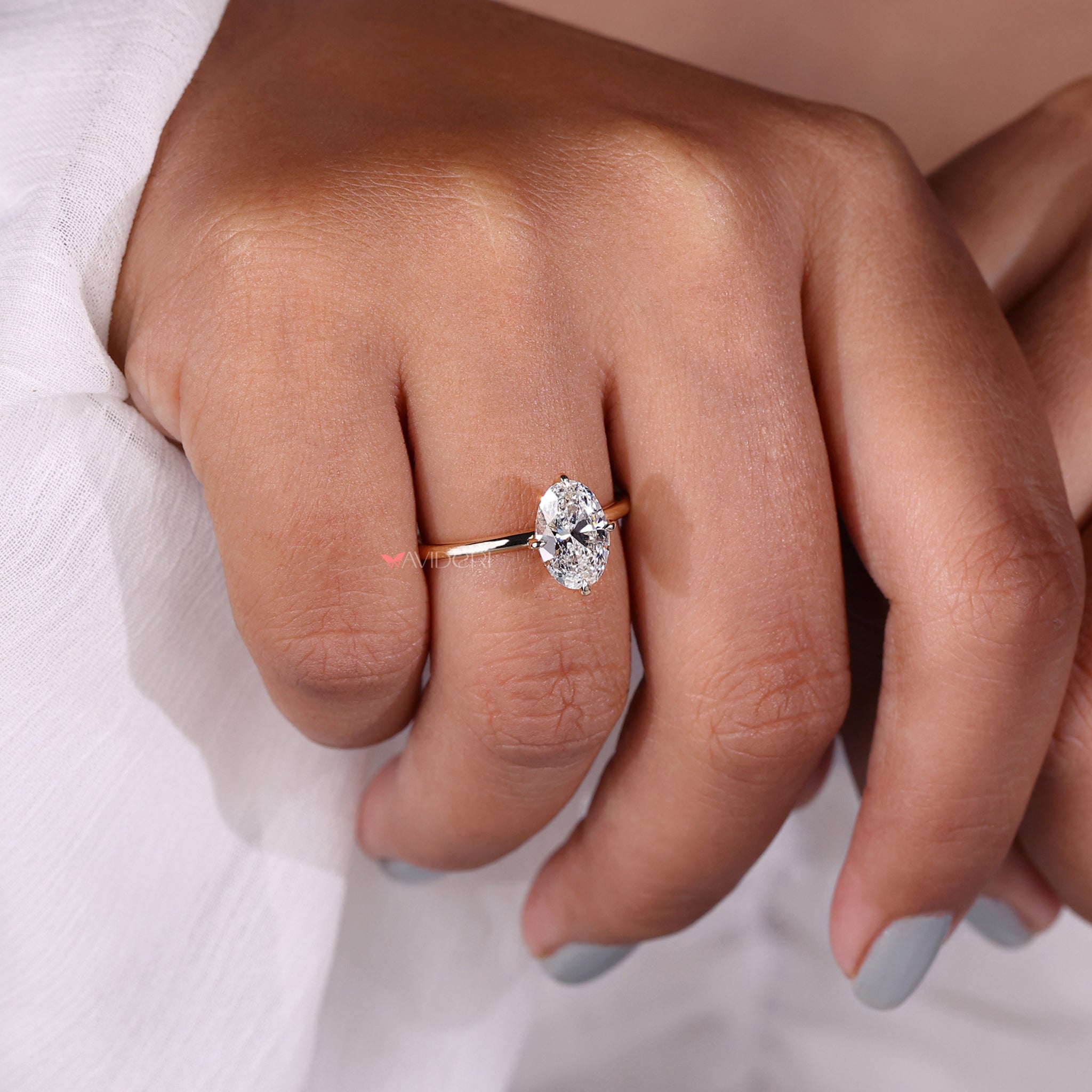 compass prong setting, prong setting ring, yellow gold diamond ring, oval solitaire engagement ring
