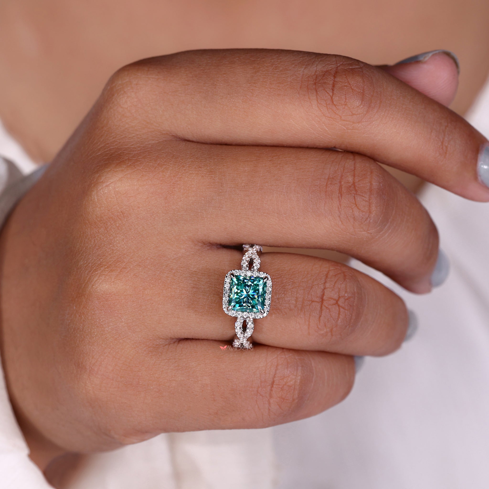 Halo princess cut ring setting designed for added brilliance.
