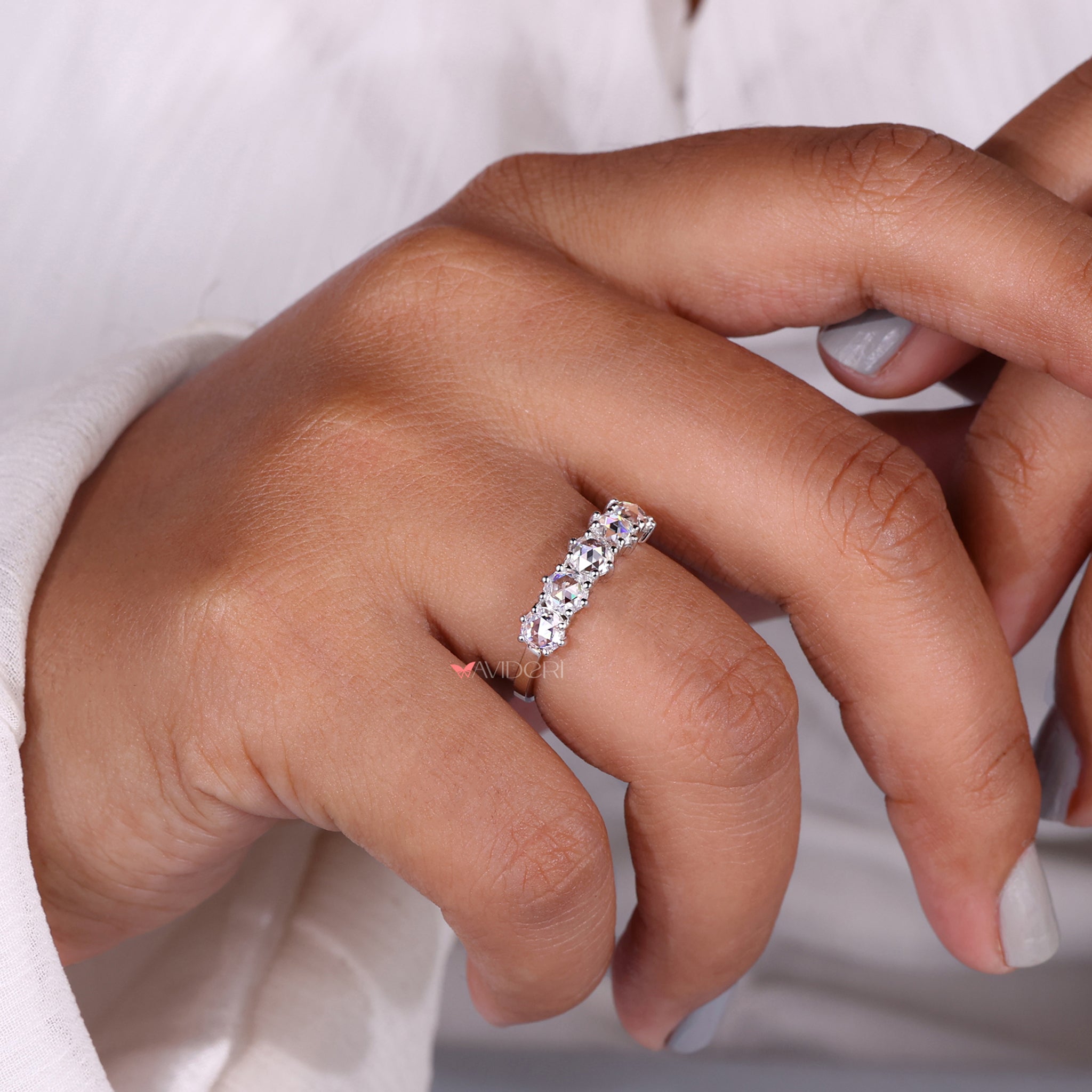 White gold lab grown band with shining diamonds.

