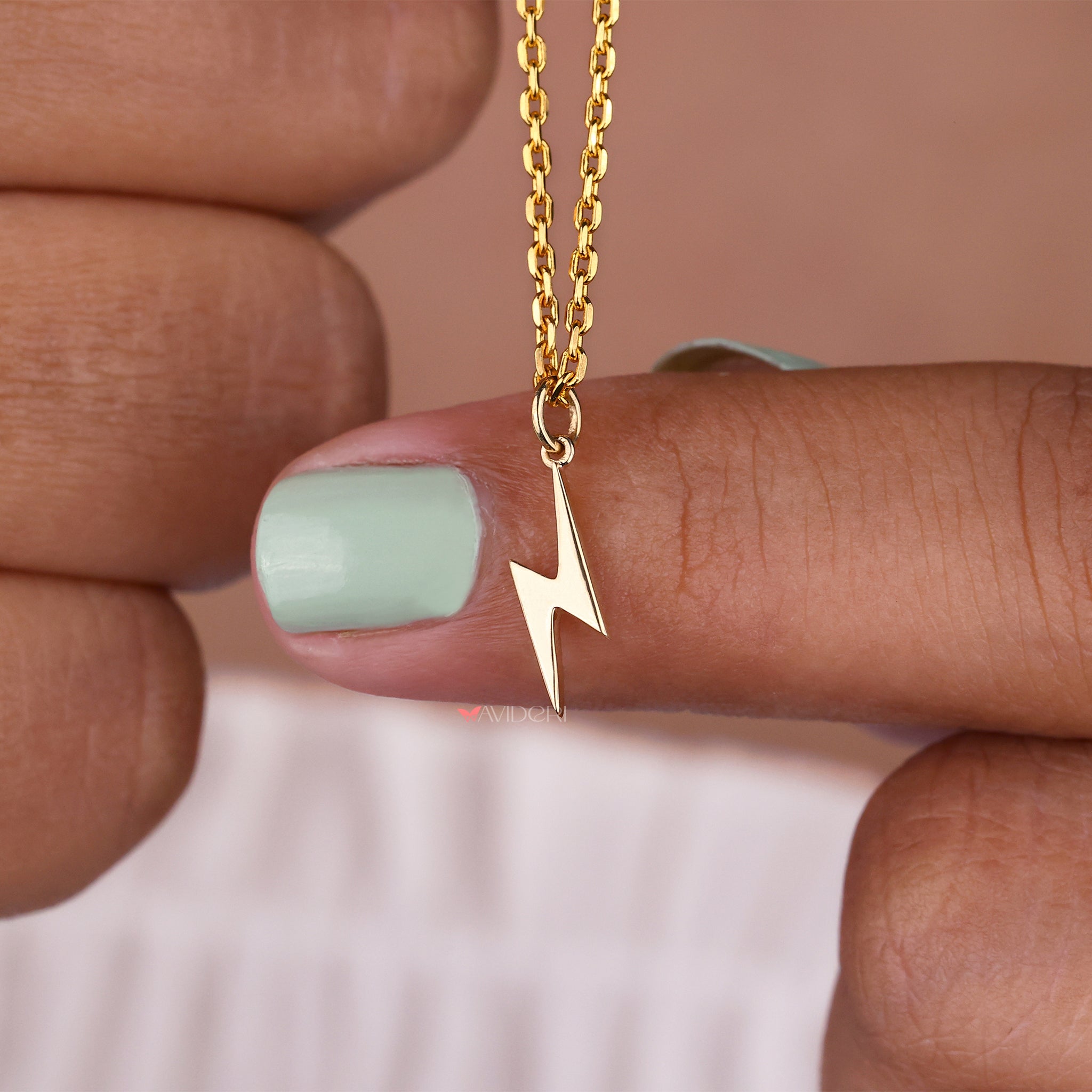 Yellow gold pendant with a warm, classic finish.