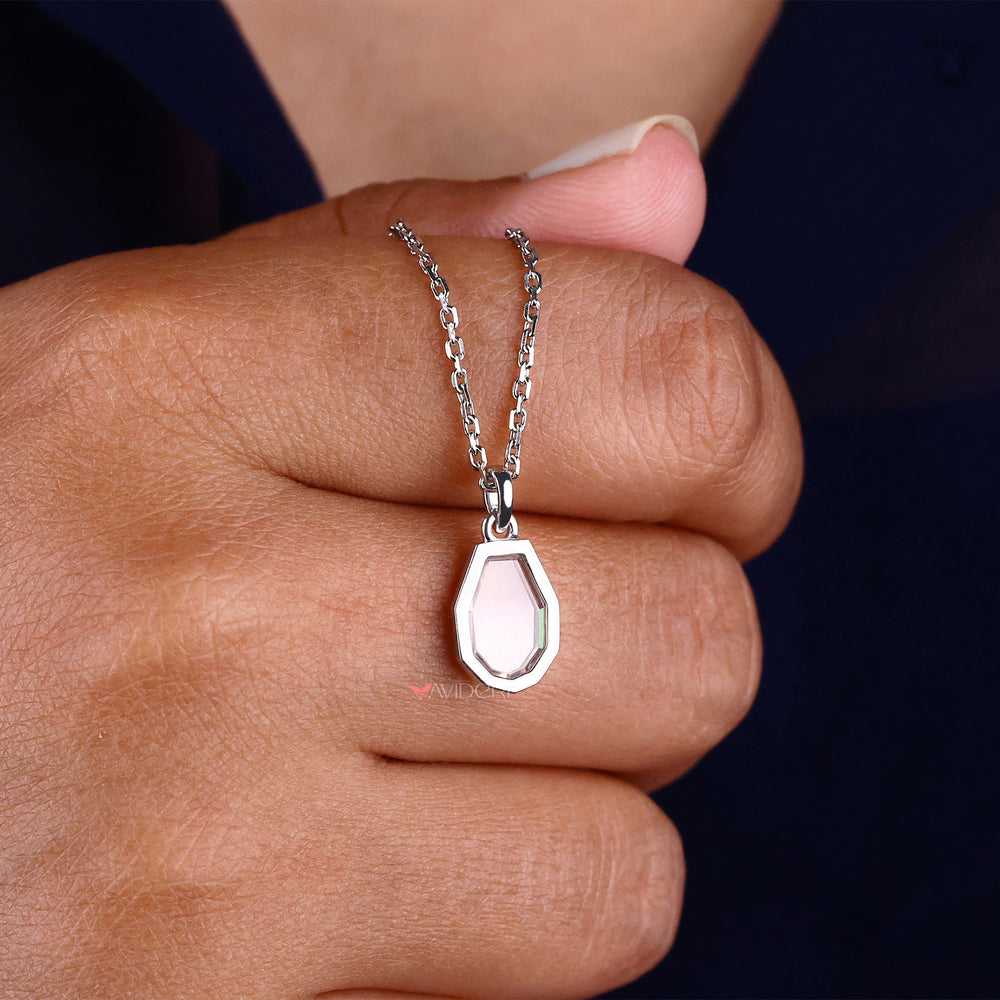Portrait Bezel Set pendant, featuring a sleek bezel setting that highlights the gemstone's brilliance.