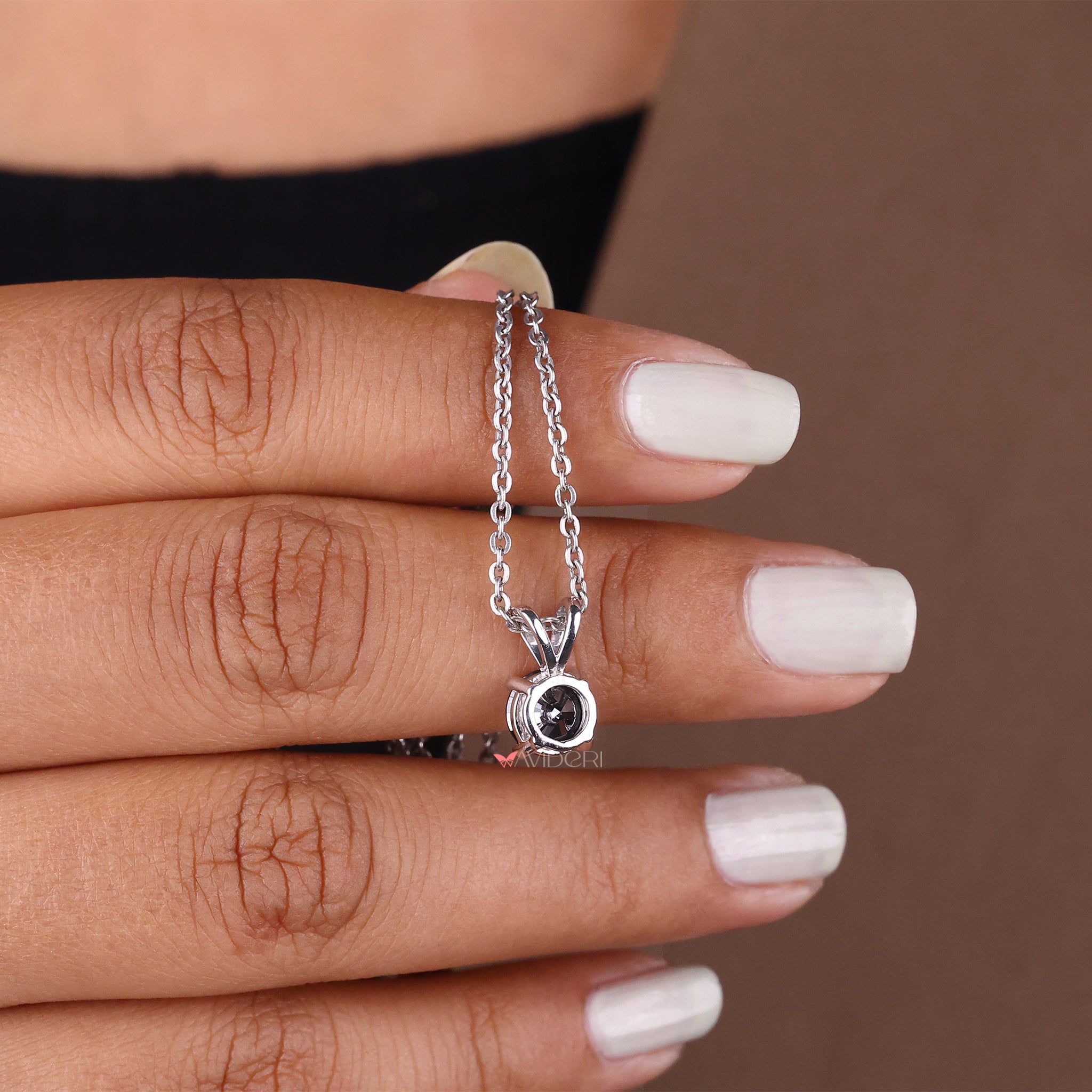 Bunny ear pendant with a round cut pendant for playful elegance.