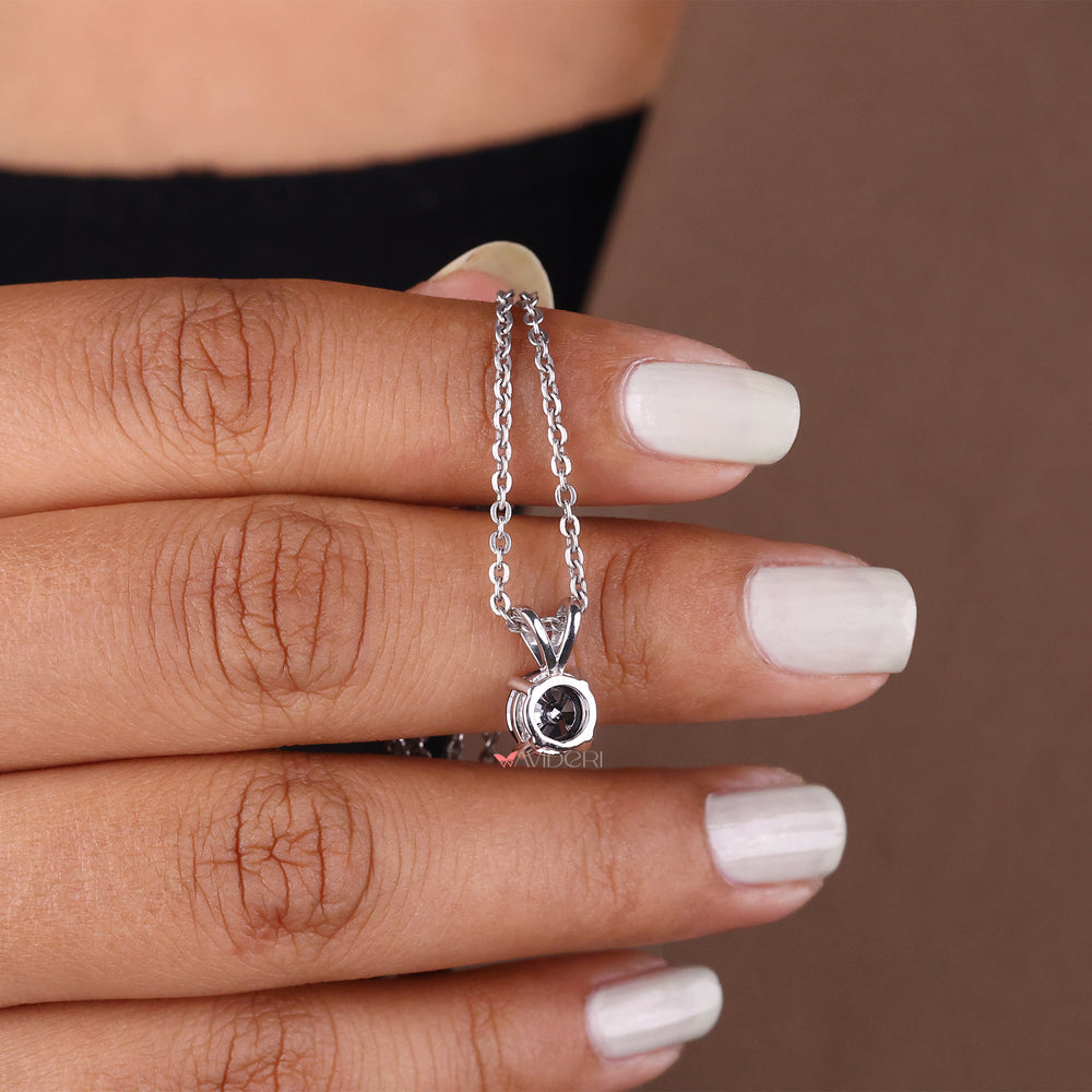 Bunny ear pendant with a round cut pendant for playful elegance.