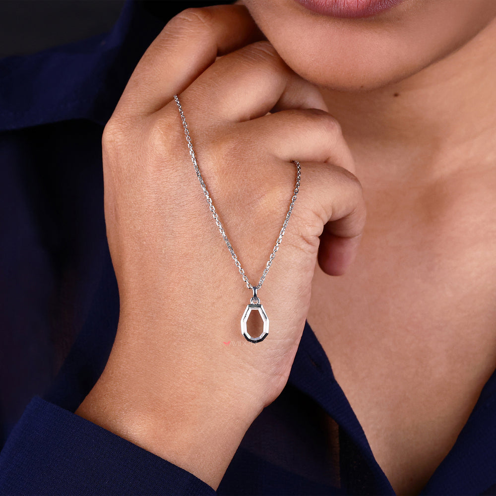 Solitaire pendant with a portrait cut, offering a classic and elegant touch to any jewelry collection.