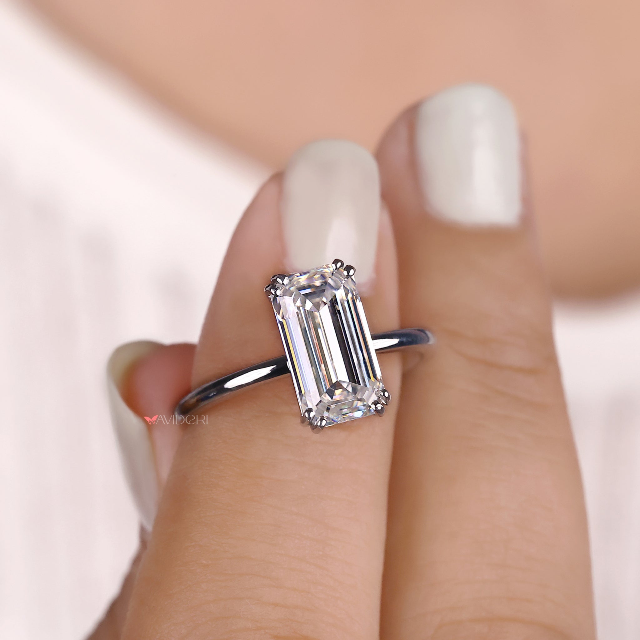 Emerald Cut Engagement Ring In Solitaire Style
