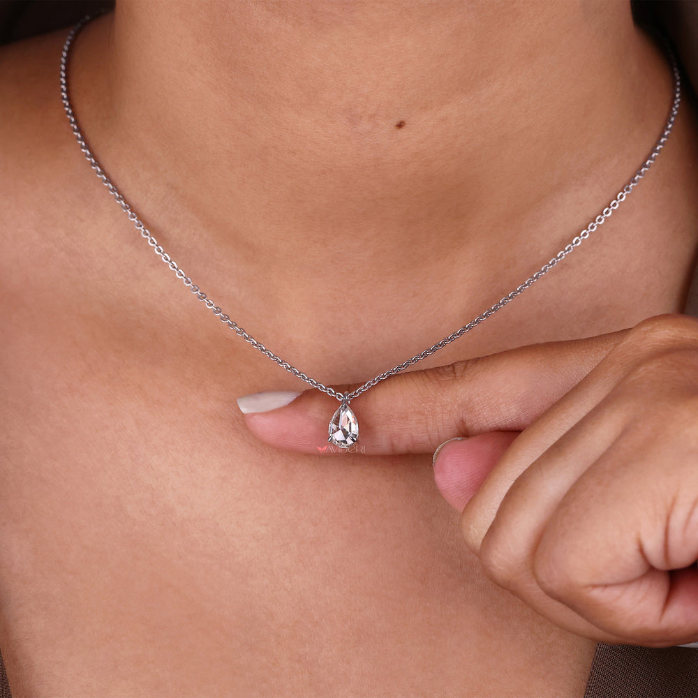 White gold pendant with a pear cut stone, an elegant addition to your jewelry collection.