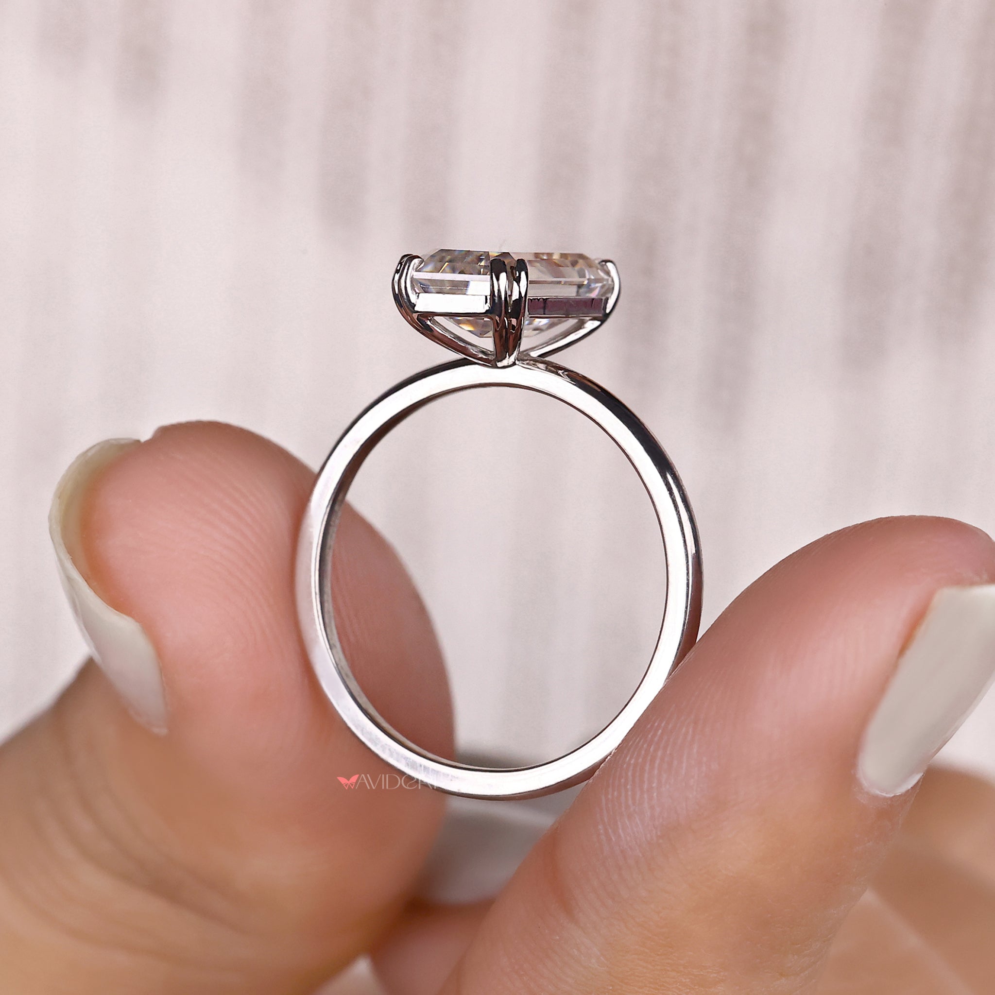 Emerald Cut Engagement Ring In Solitaire Style