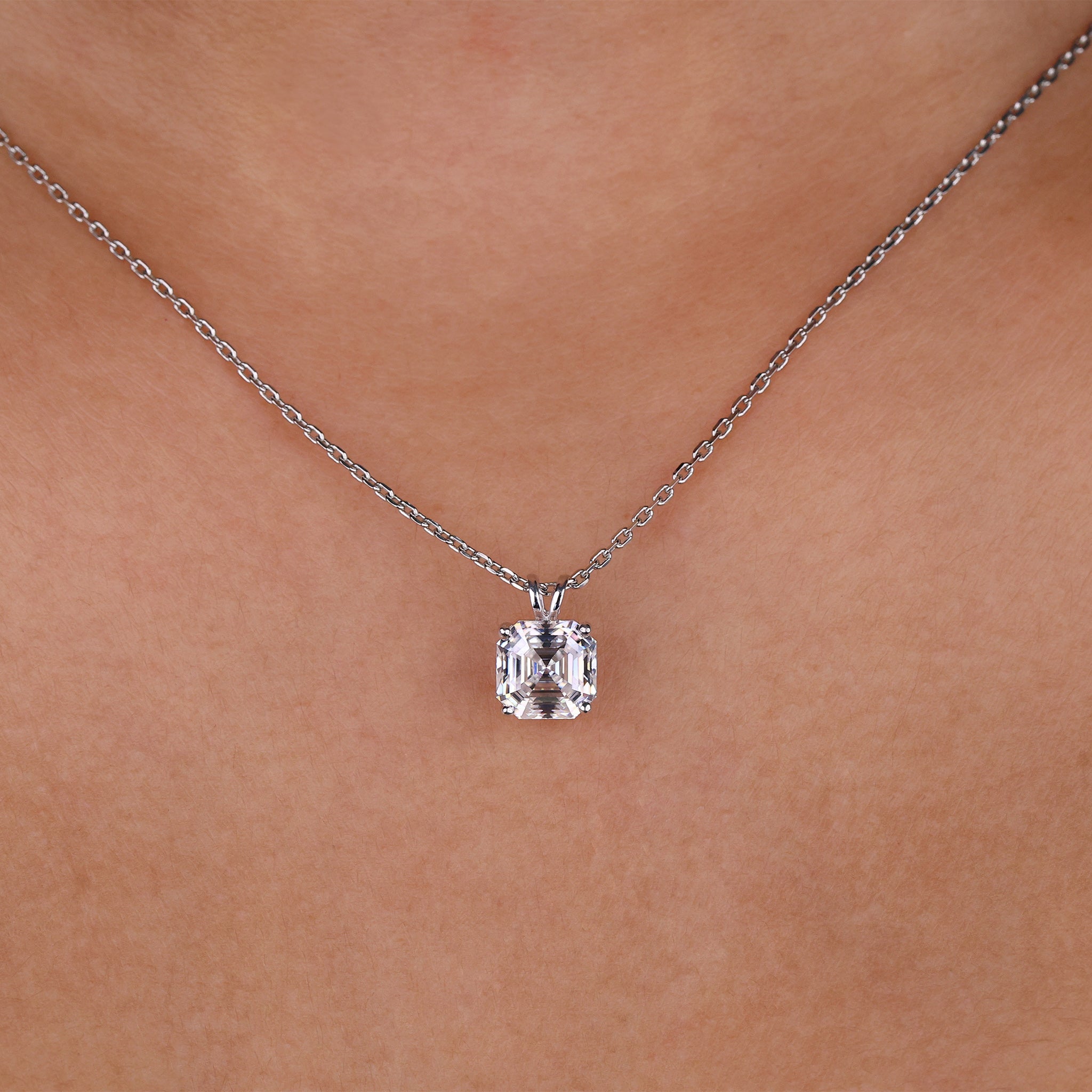 Prong setting pendant securely holding a sparkling stone.