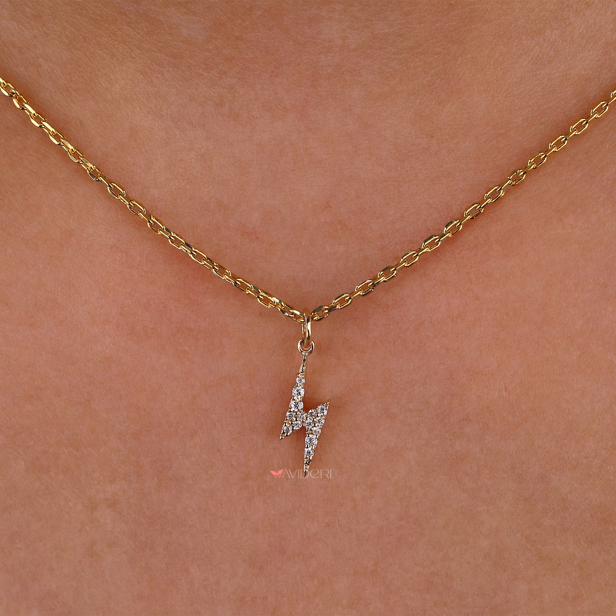 Thunderbolt pendant capturing bold, energetic style.