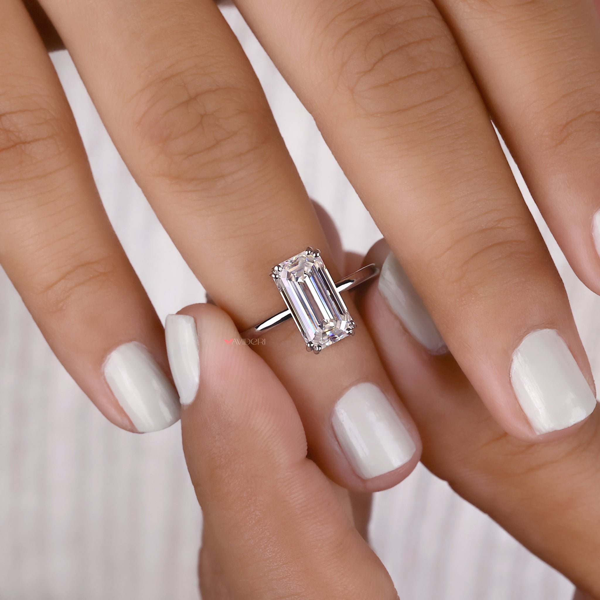 Emerald Cut Engagement Ring In Solitaire Style