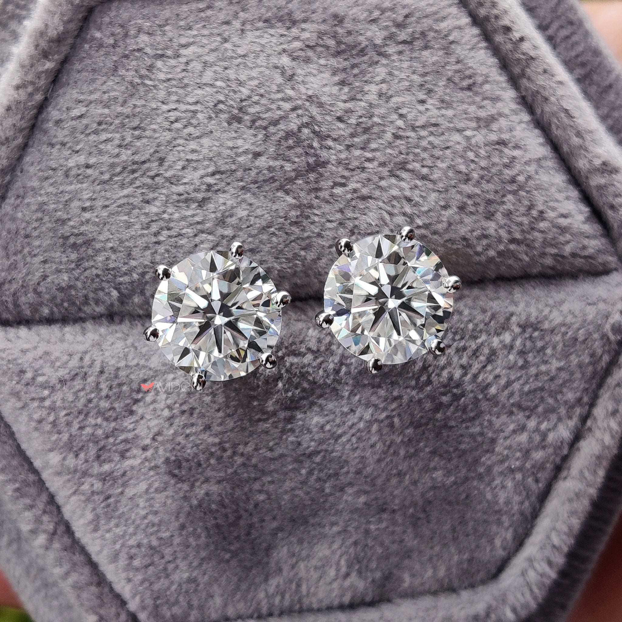 Six prong earrings securely hold the gemstone with elegance.