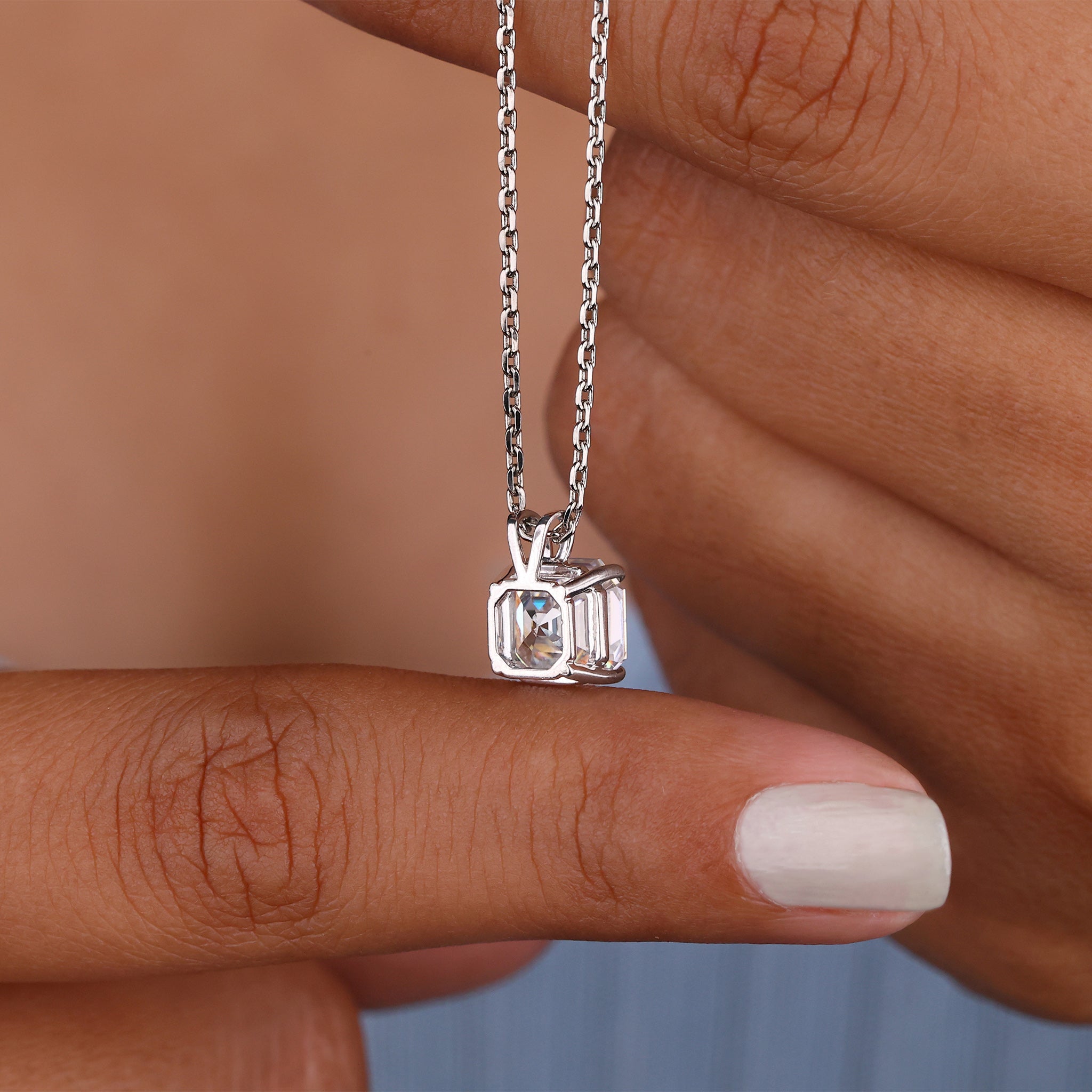 White gold pendant offering a polished, shiny look.