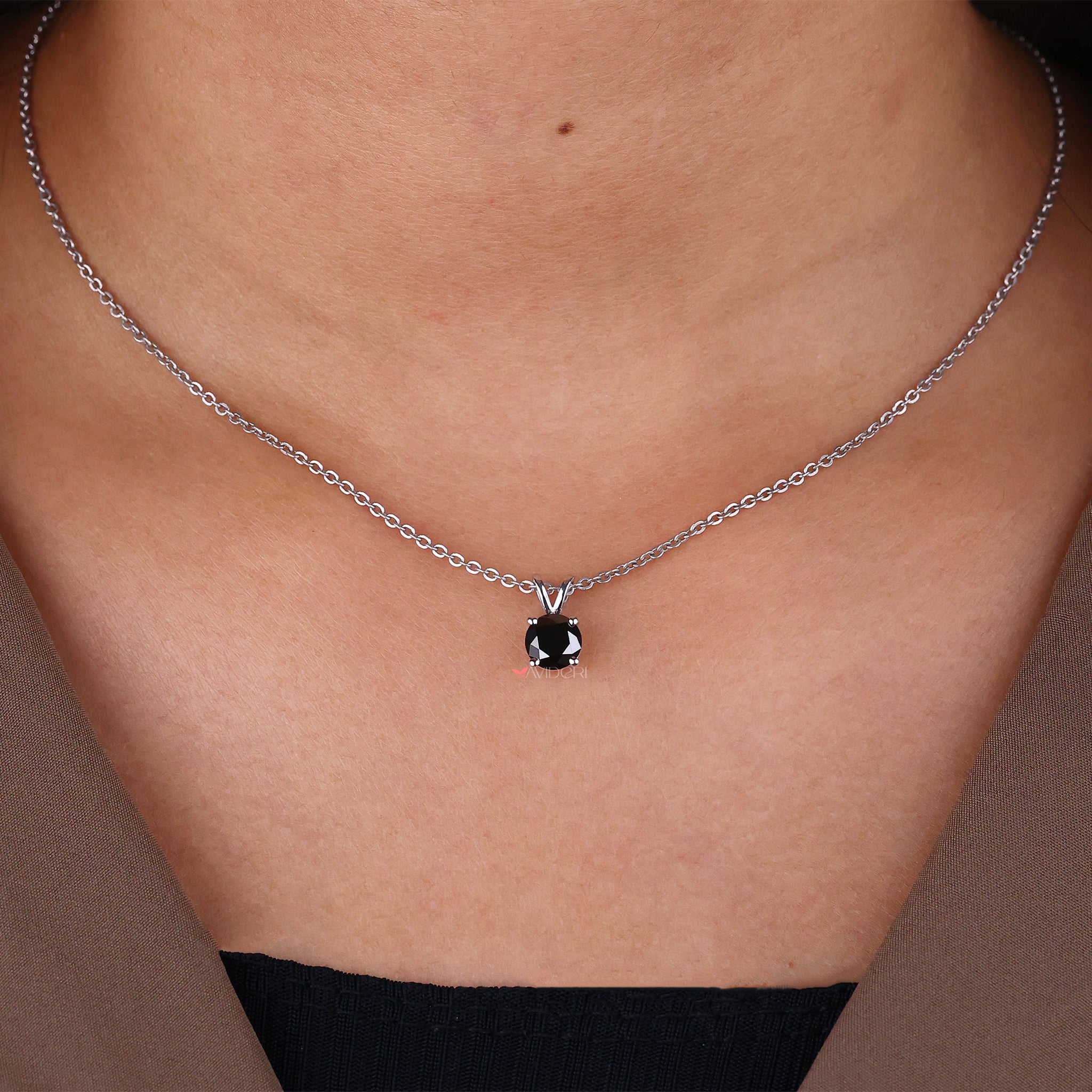 4 prong pendant with a round cut pendant for secure brilliance.