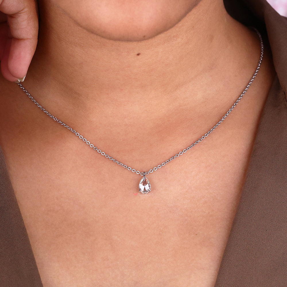 Pear rose cut moissanite pendant, offering a unique look and unmatched brilliance for every occasion.